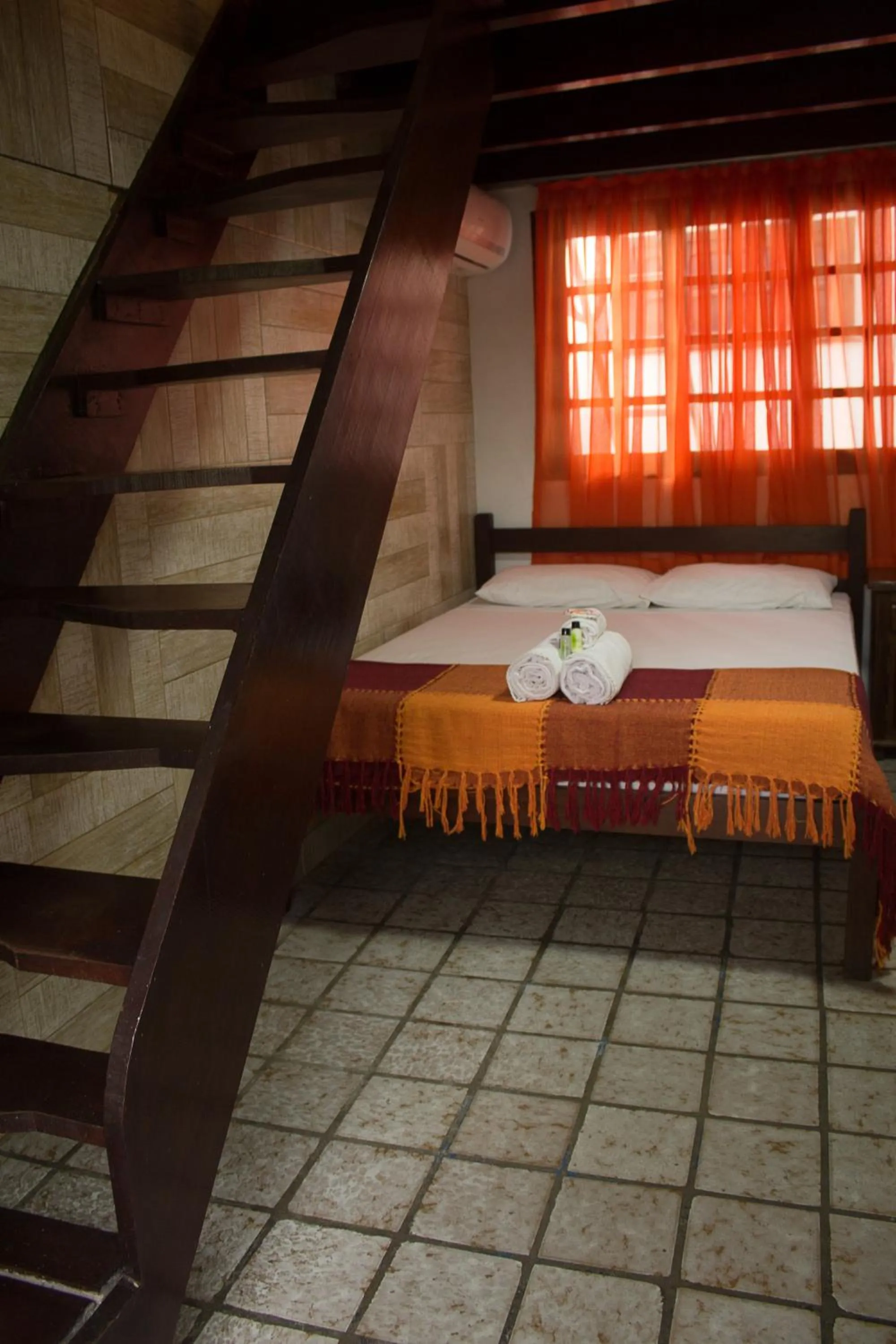 Bed in Pousada Casa da Pedra