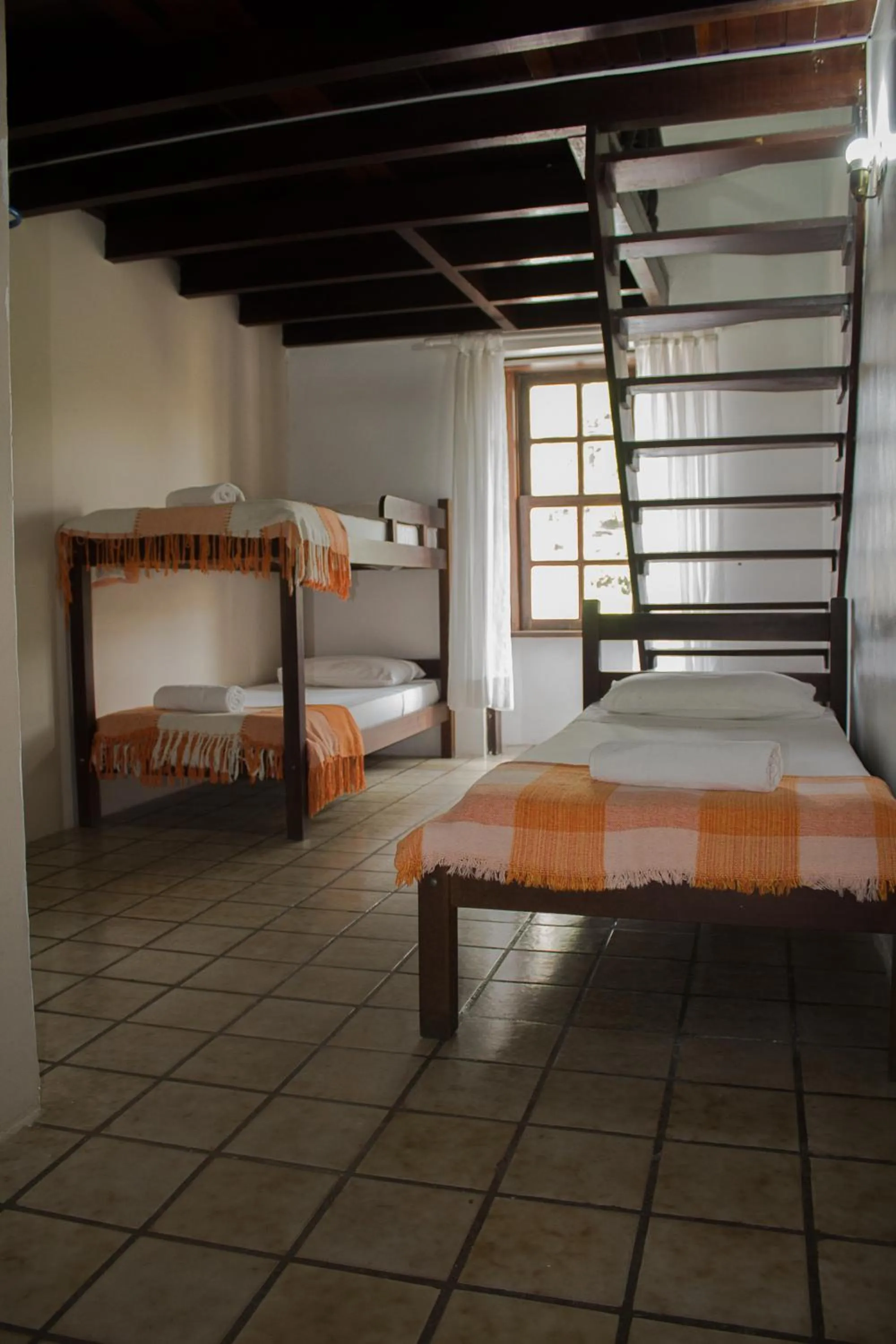 Bed in Pousada Casa da Pedra