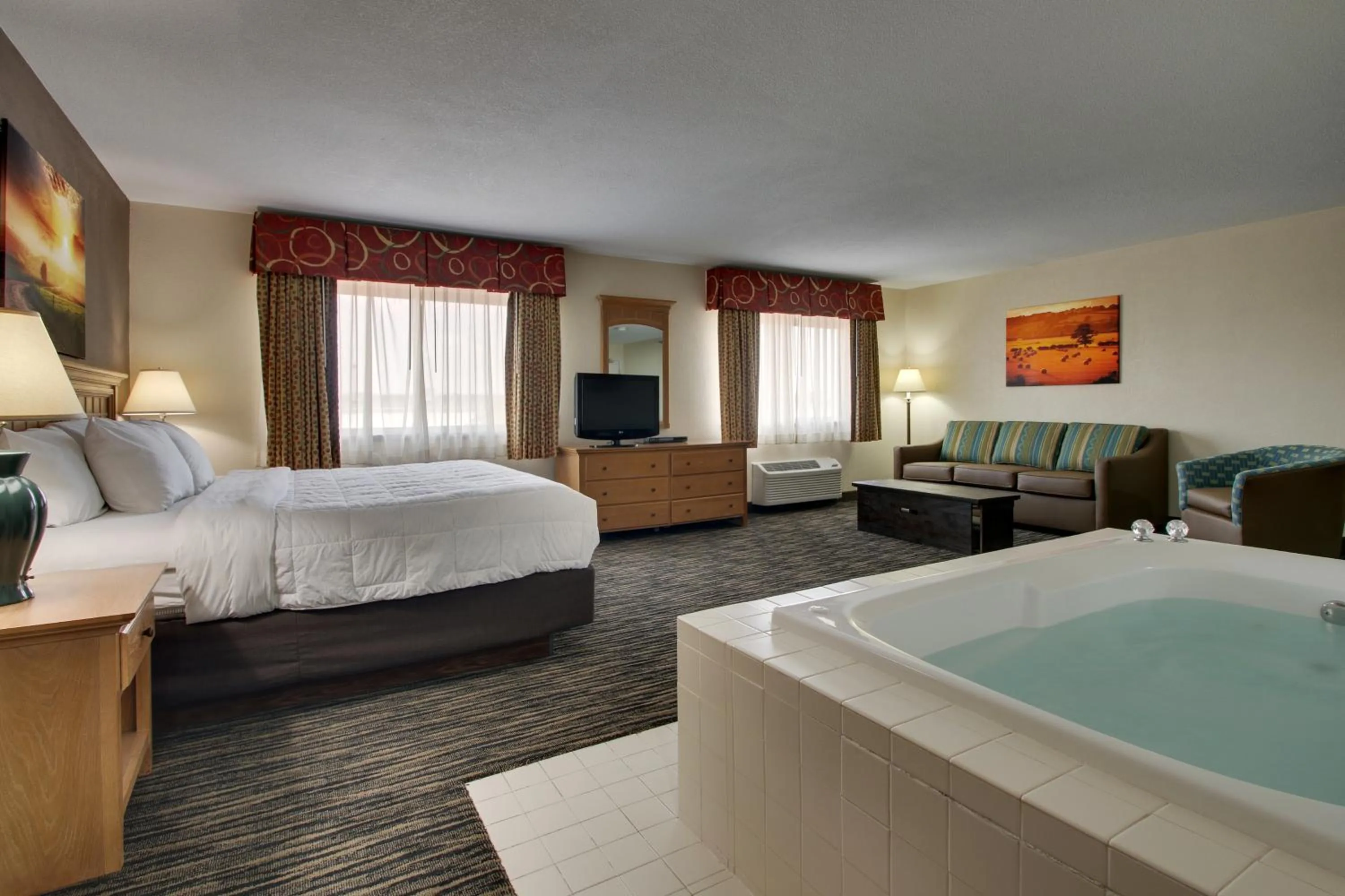 Bed in EverSpring Inn & Suites
