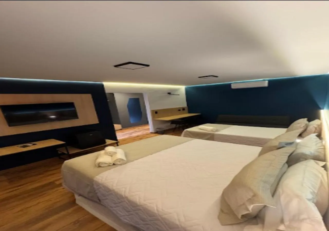 Bed in Minas Garden Hotel