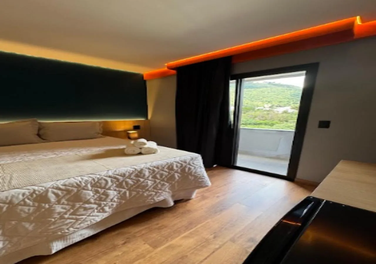 Bed in Minas Garden Hotel