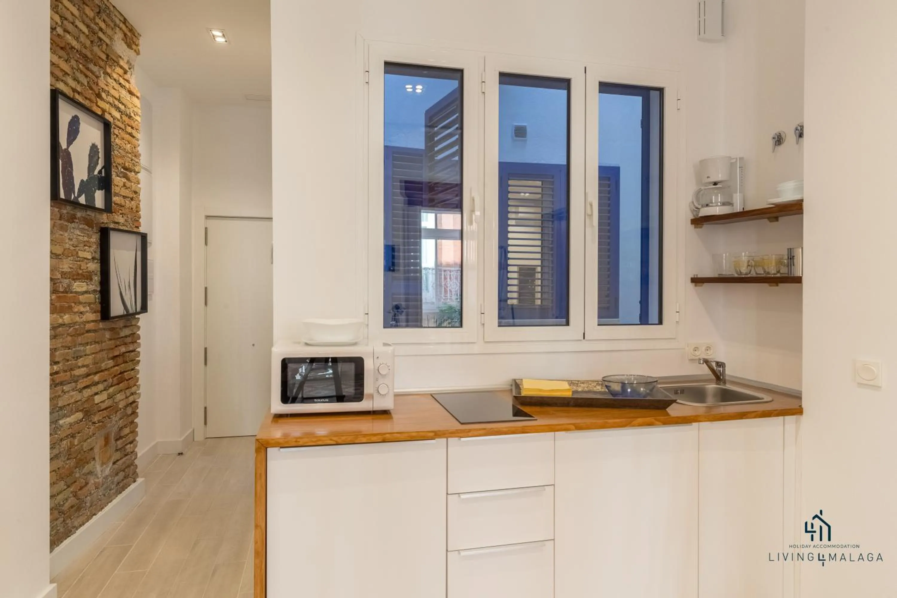 Kitchen or kitchenette in Living4Malaga Skyline Apartments