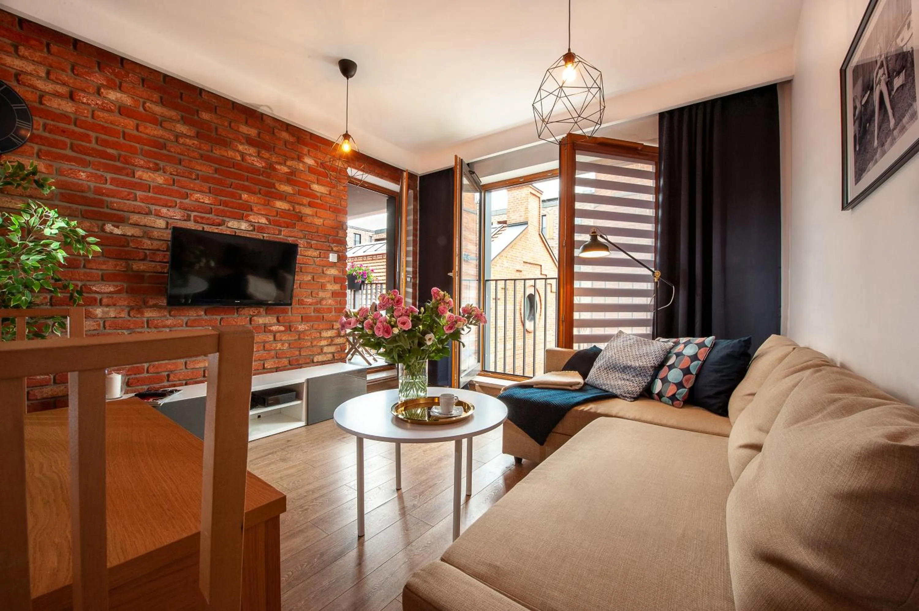 Communal lounge/ TV room in Browar Lubicz Residence