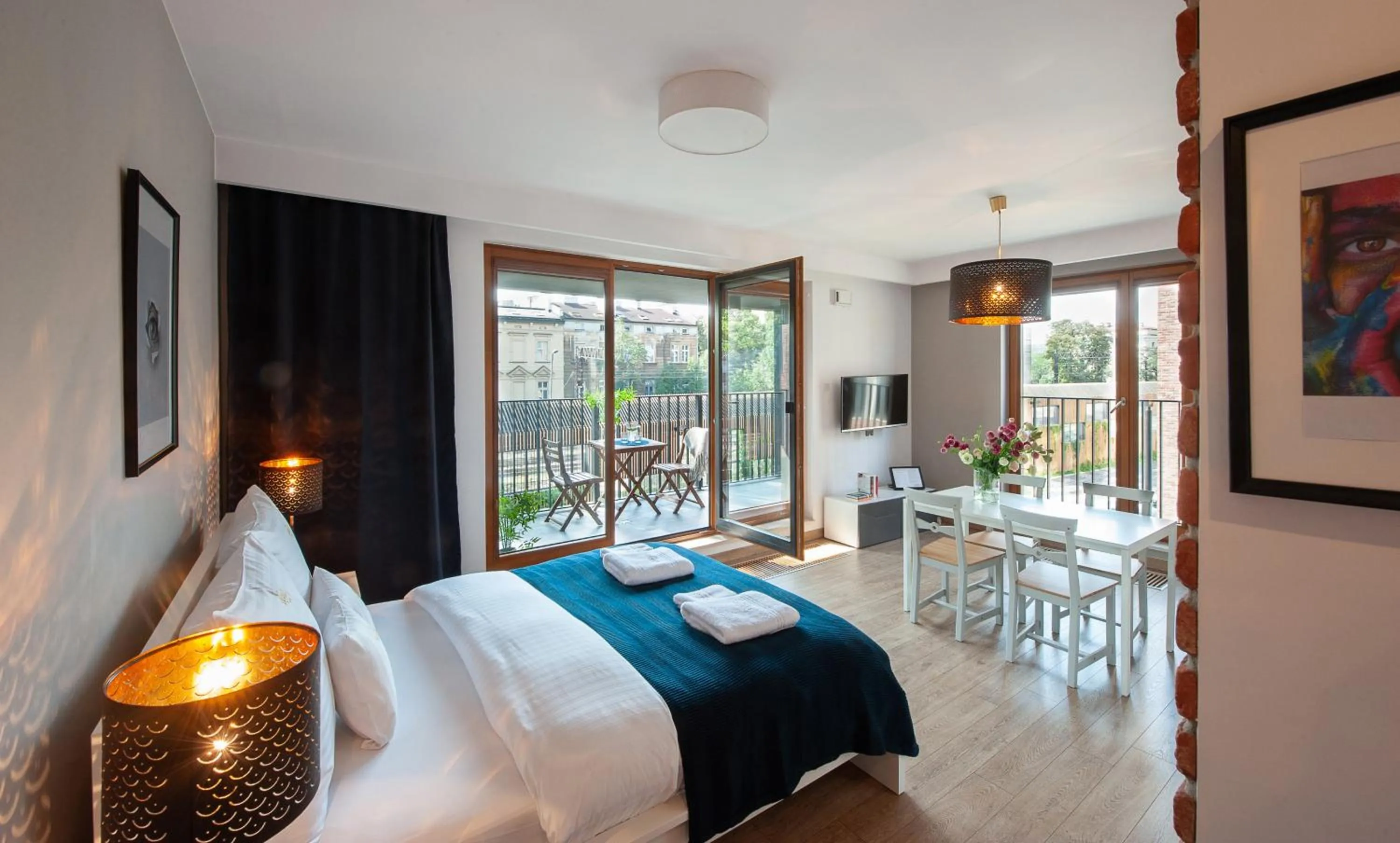 Communal lounge/ TV room, Bed in Browar Lubicz Residence