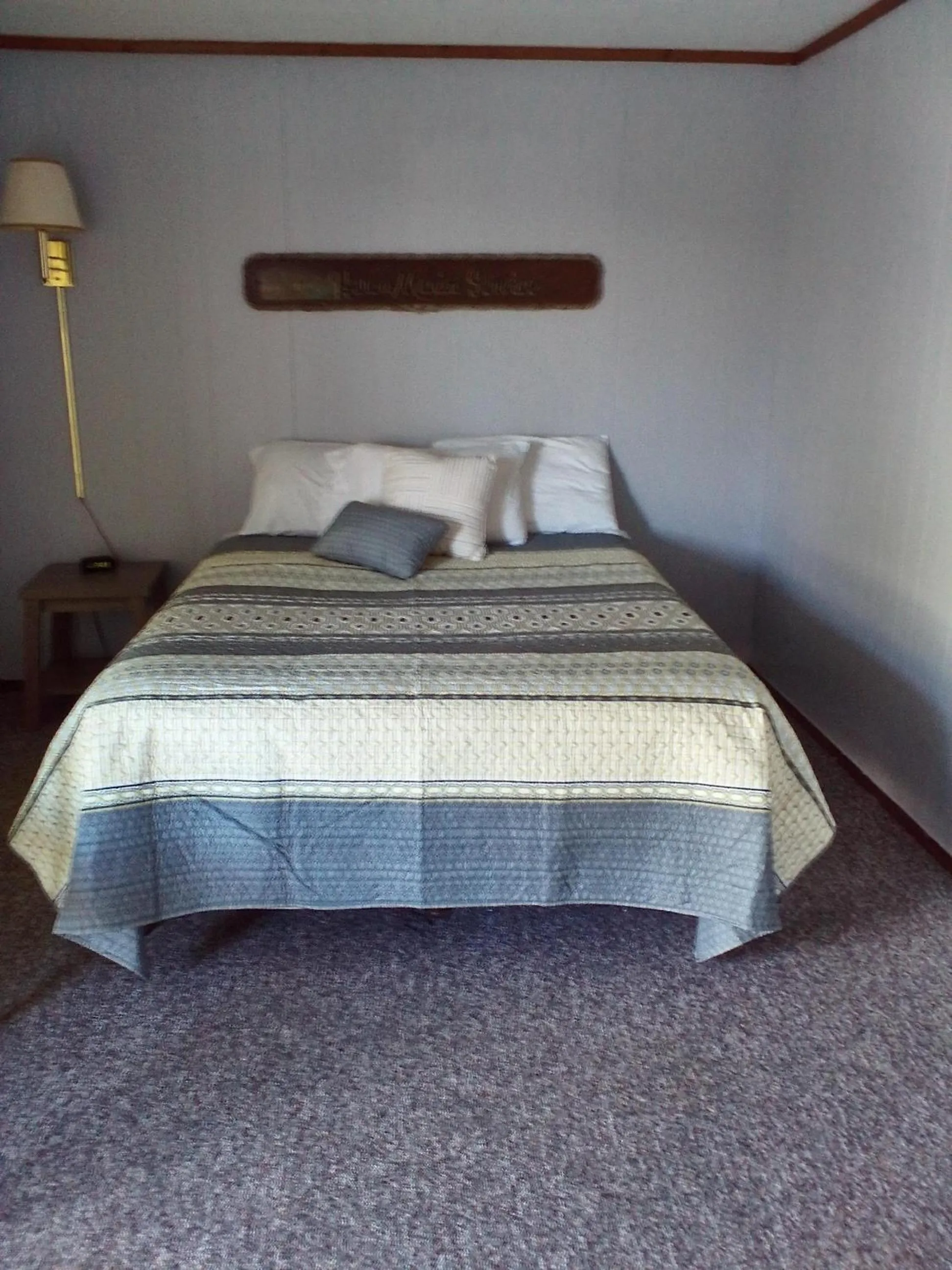 Bed in The Monarch Motel