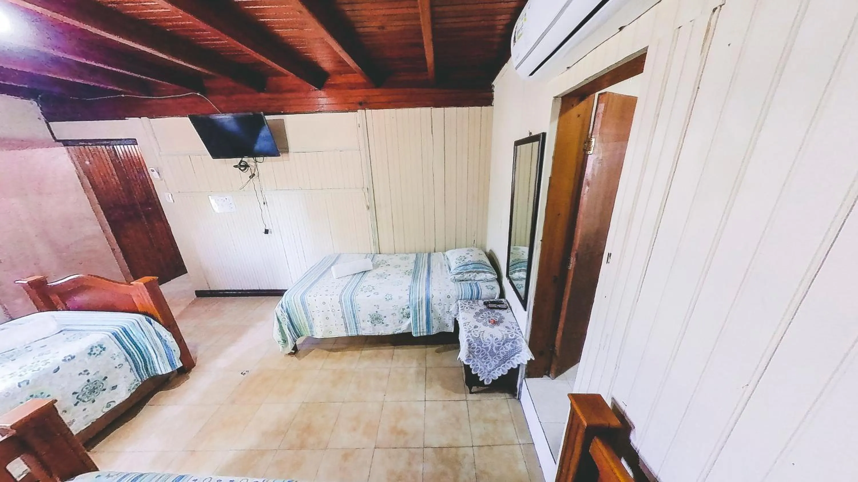 Bed in Posada Nativa Miss Trinie