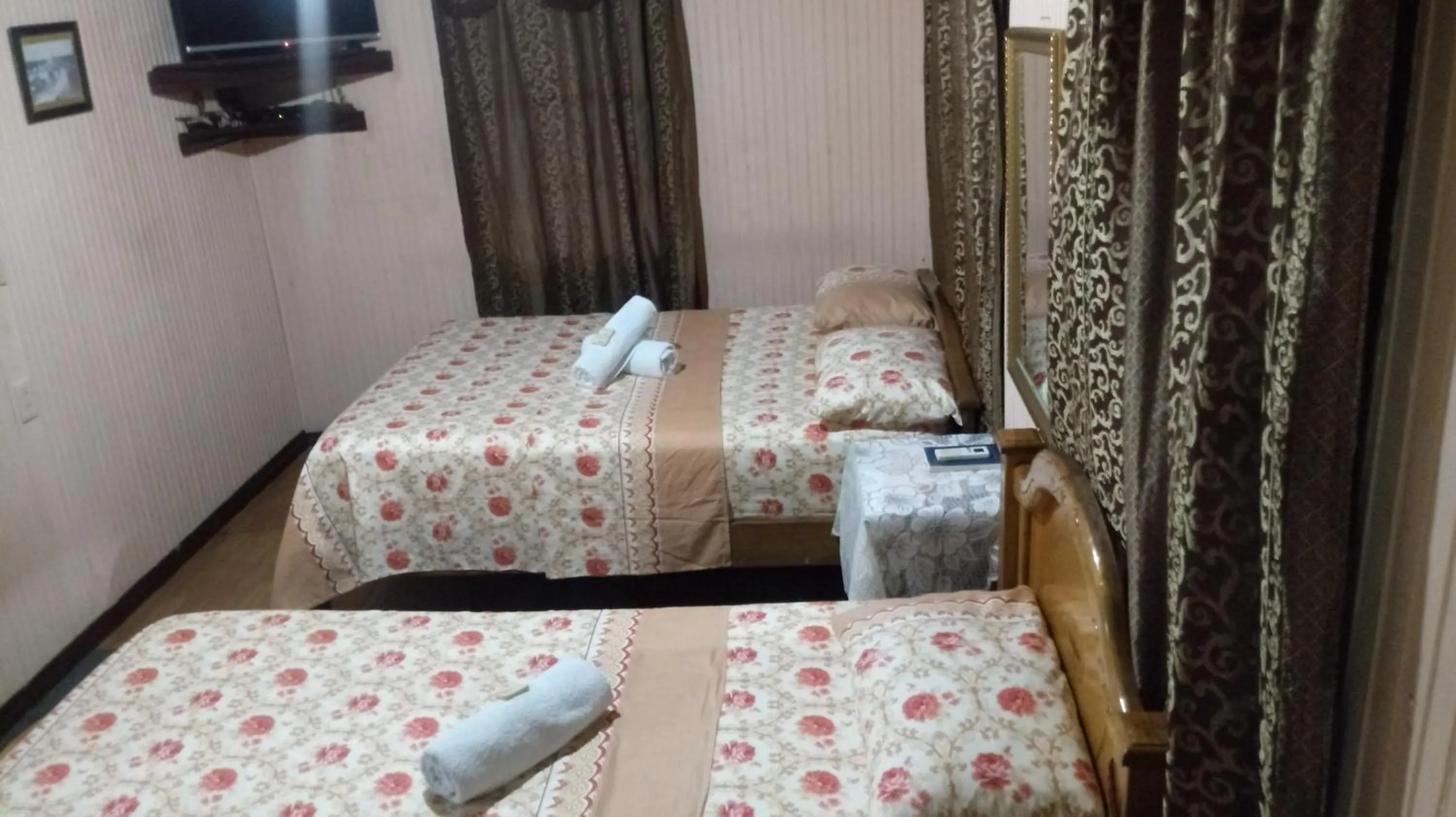 Bed in Posada Nativa Miss Trinie