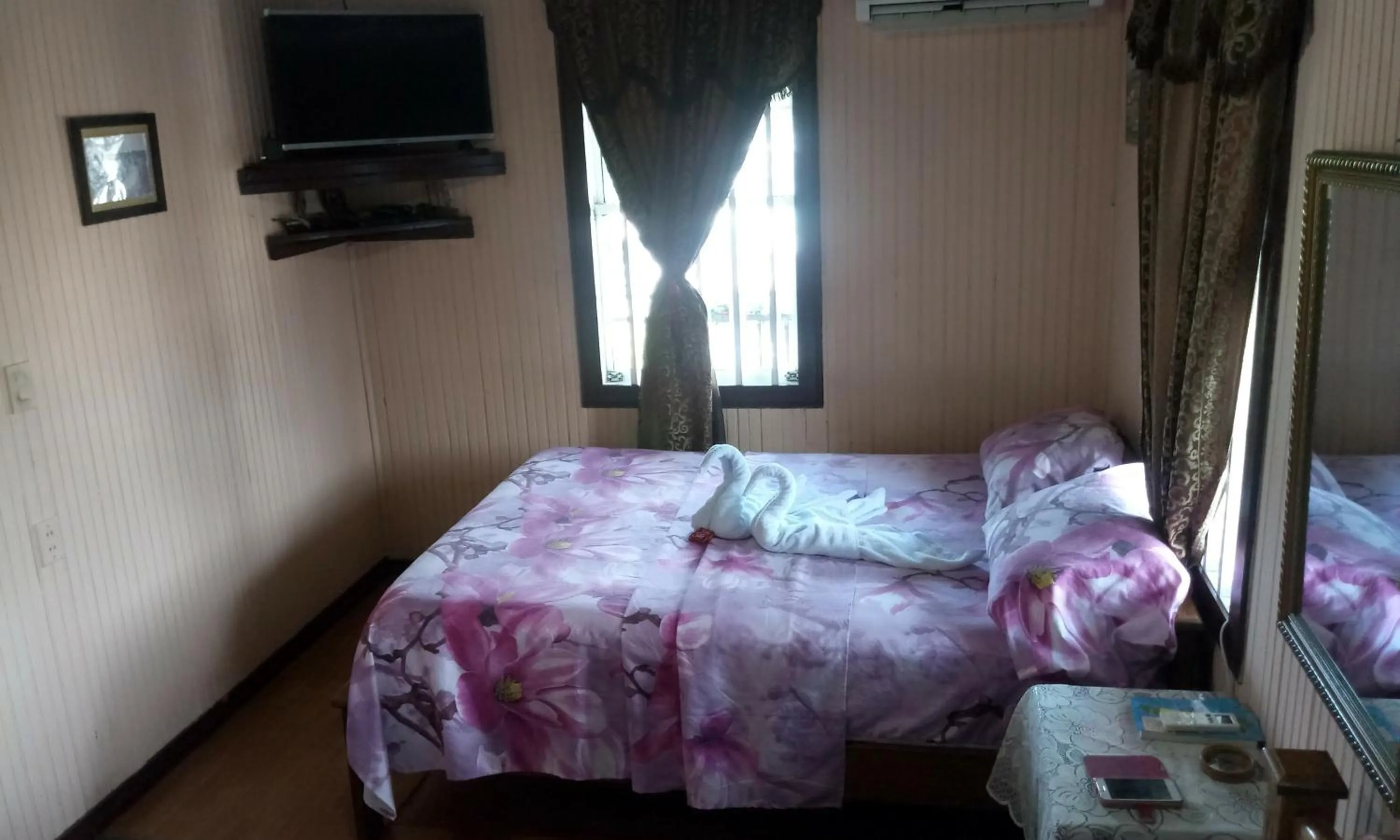 Bed in Posada Nativa Miss Trinie