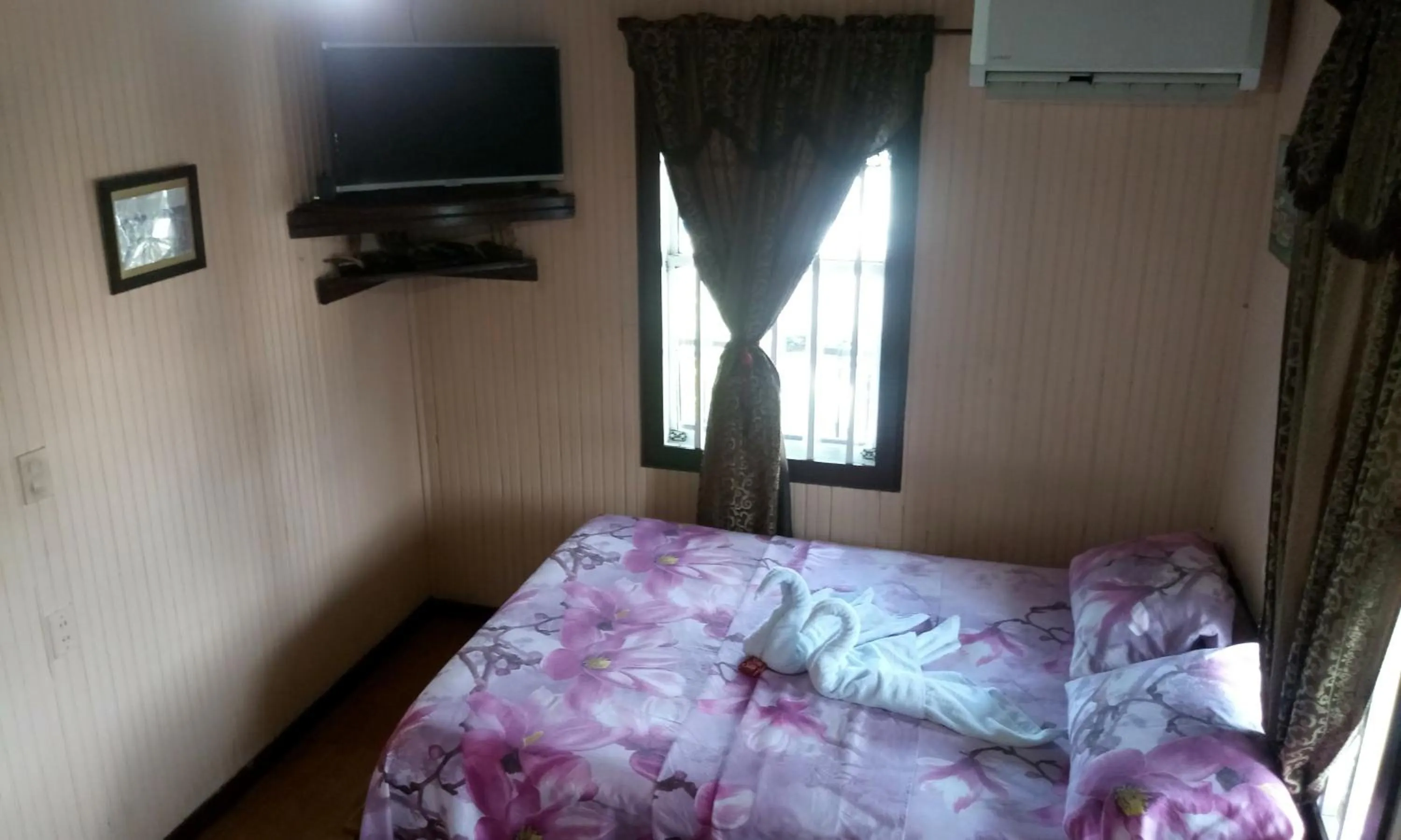 Bed in Posada Nativa Miss Trinie