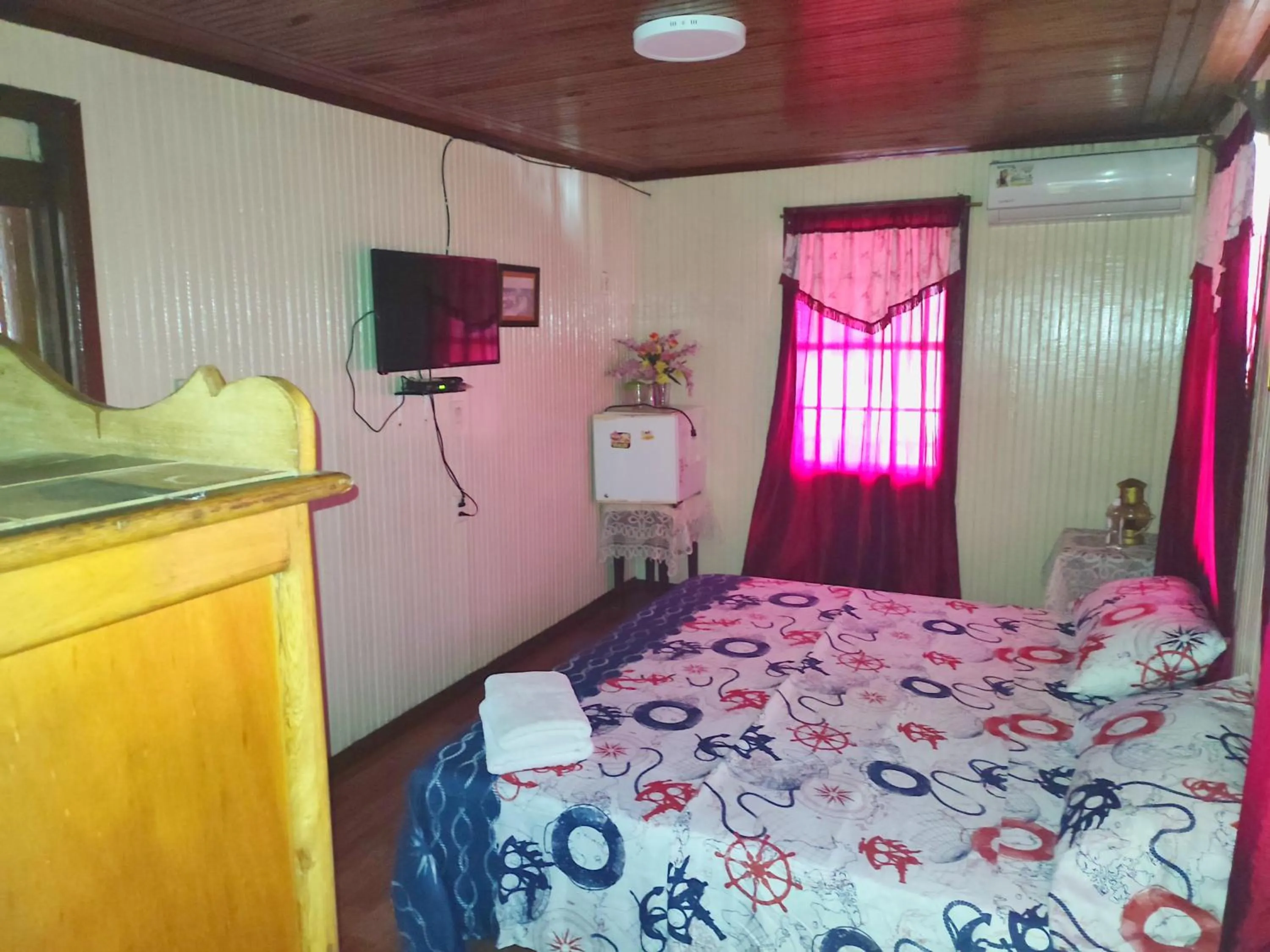 Bed in Posada Nativa Miss Trinie