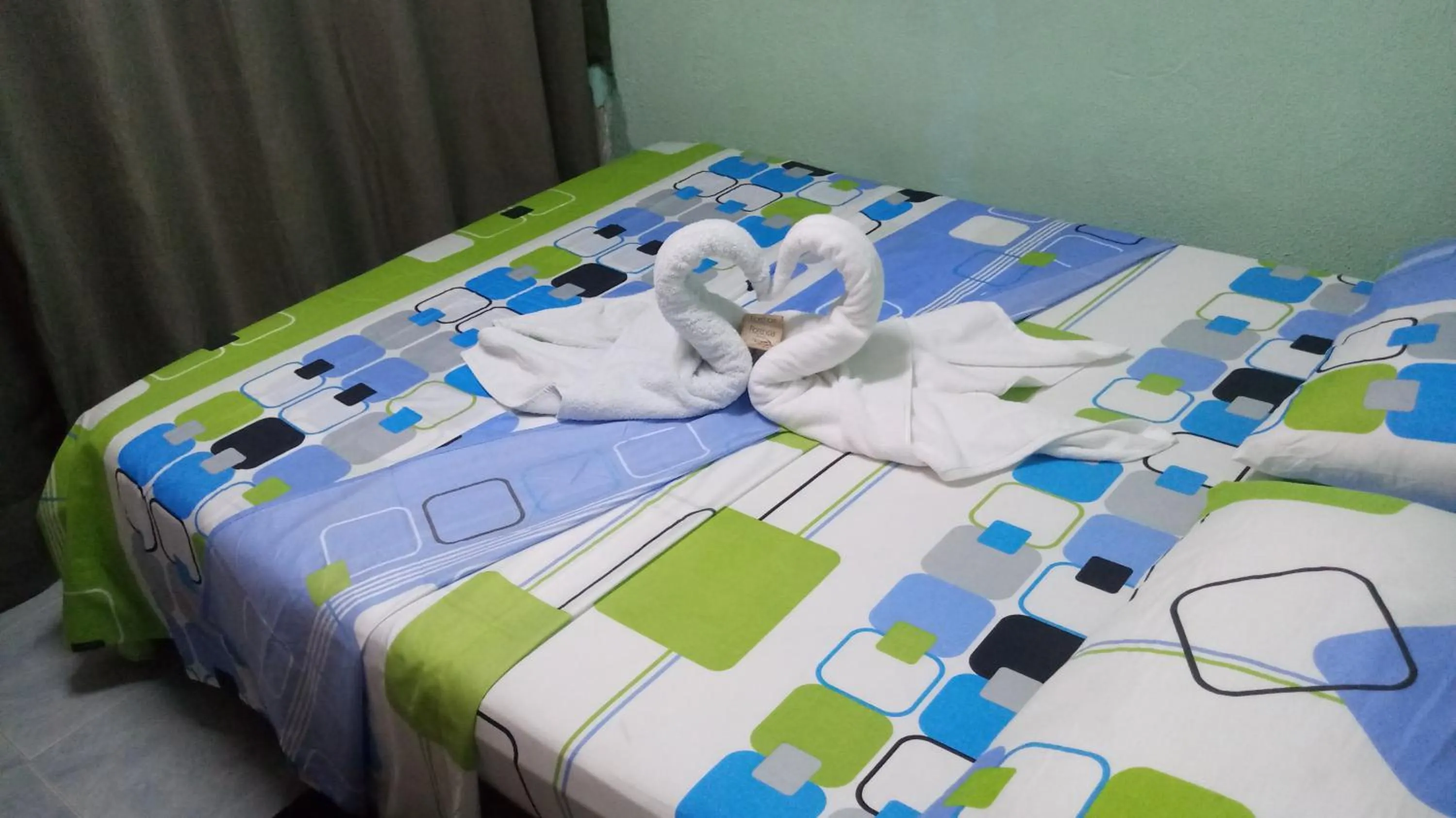 Bed in Posada Nativa Miss Trinie