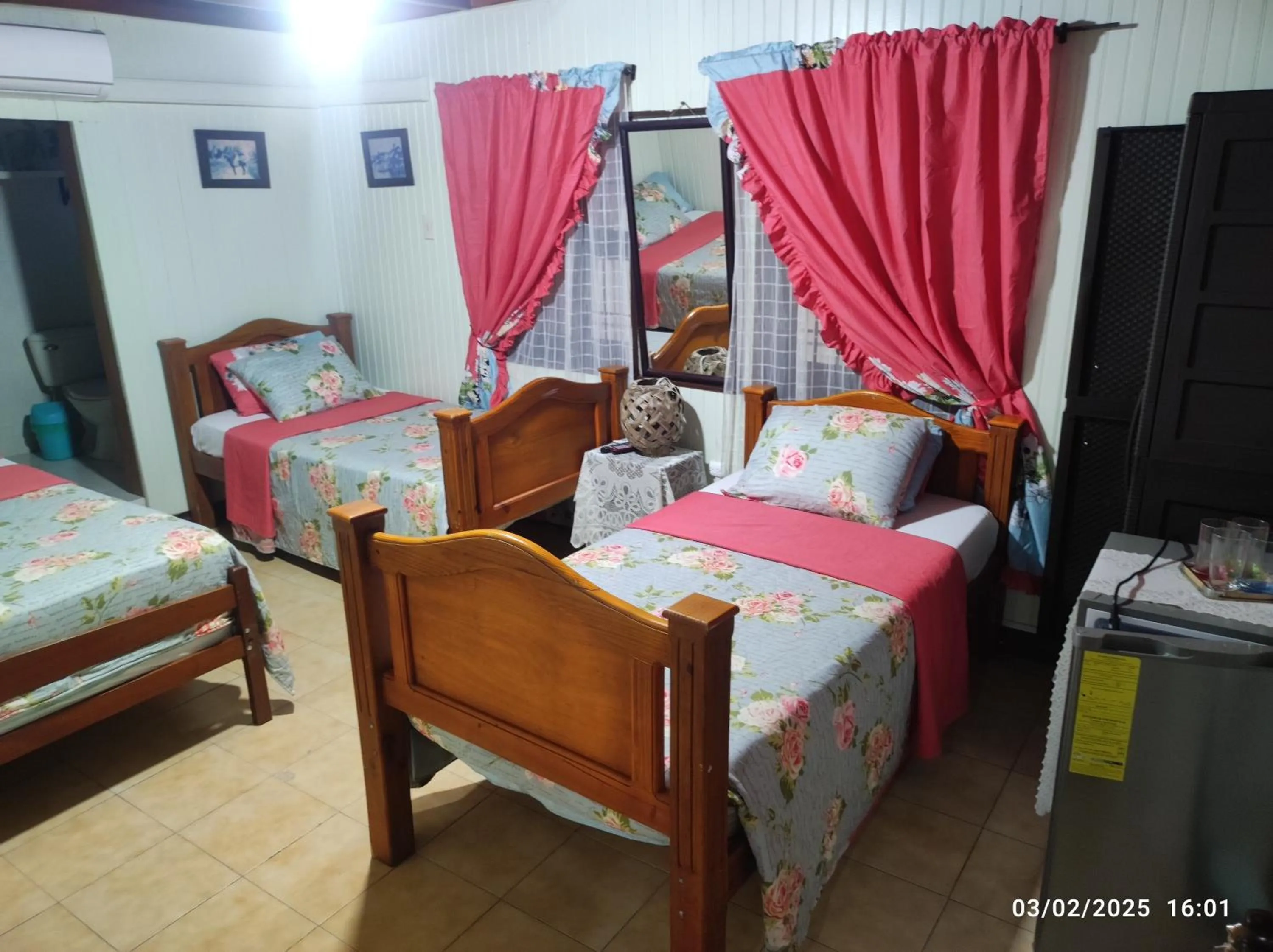 Bed in Posada Nativa Miss Trinie