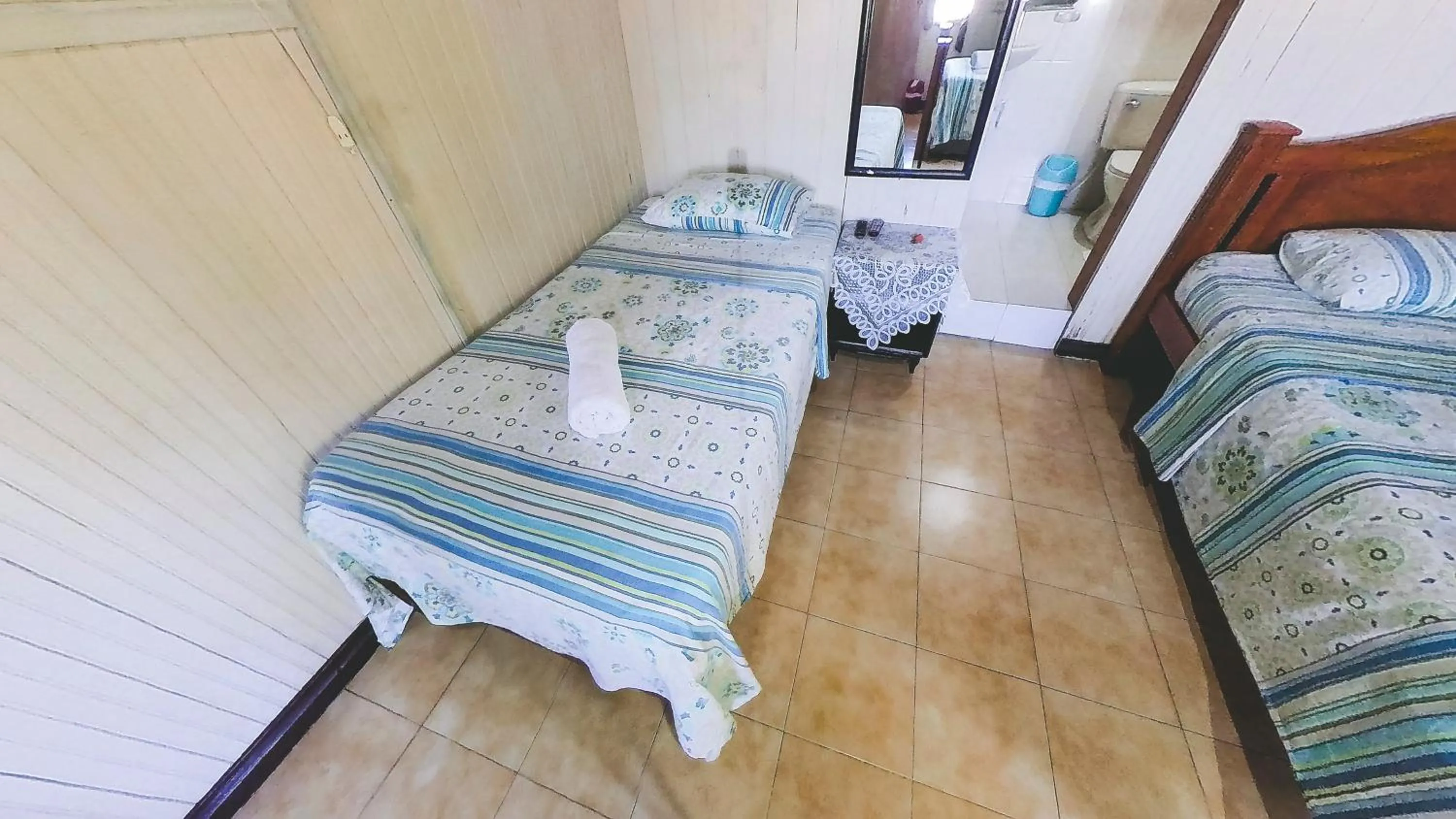 Bed in Posada Nativa Miss Trinie