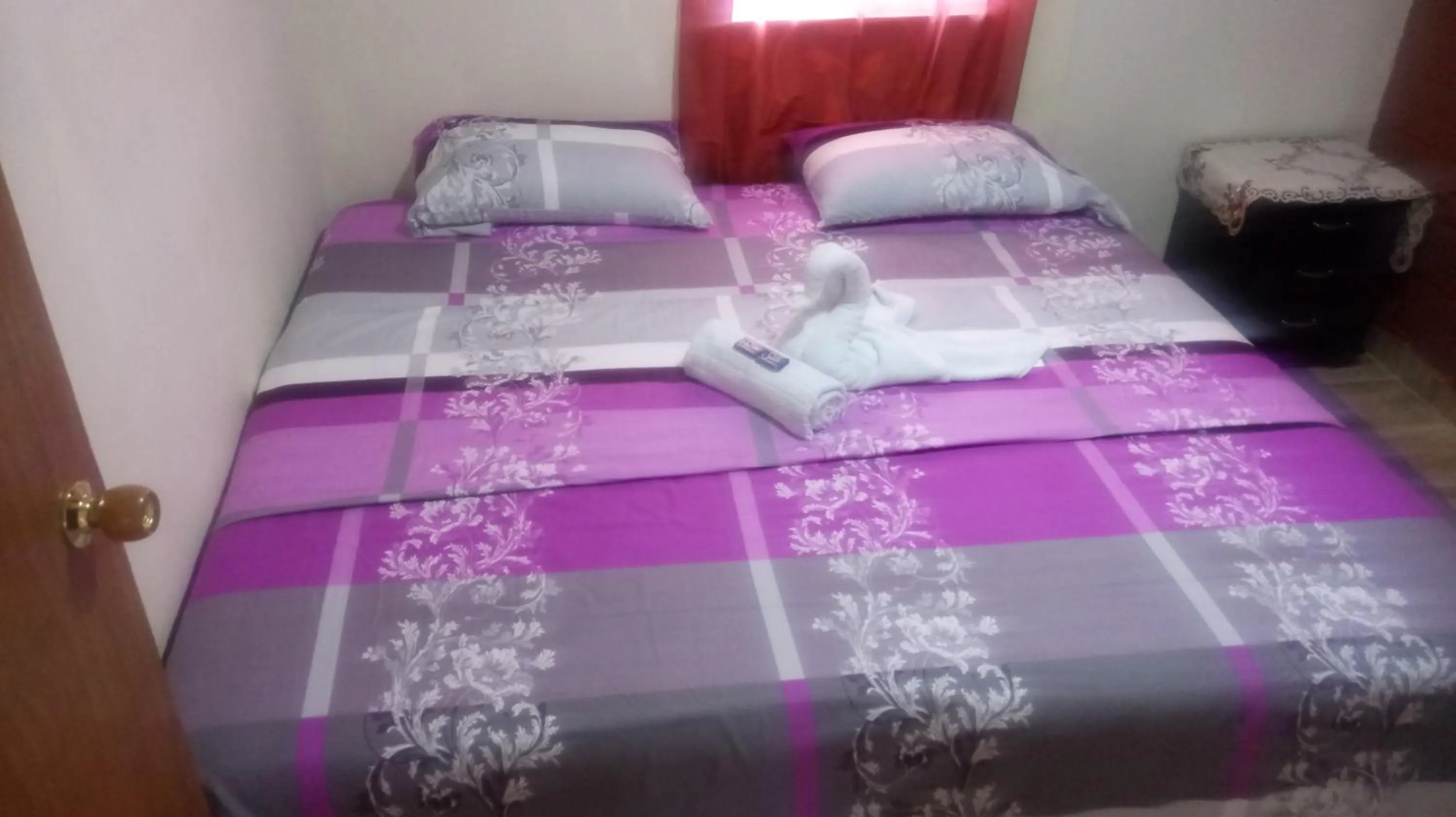 Bed in Posada Nativa Miss Trinie