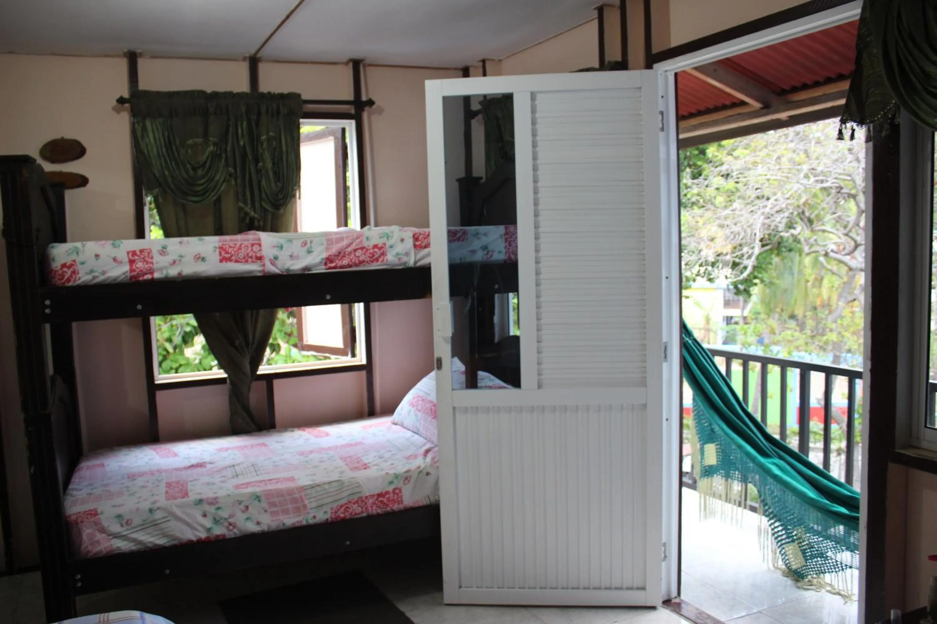 Bed in Posada Nativa Miss Trinie