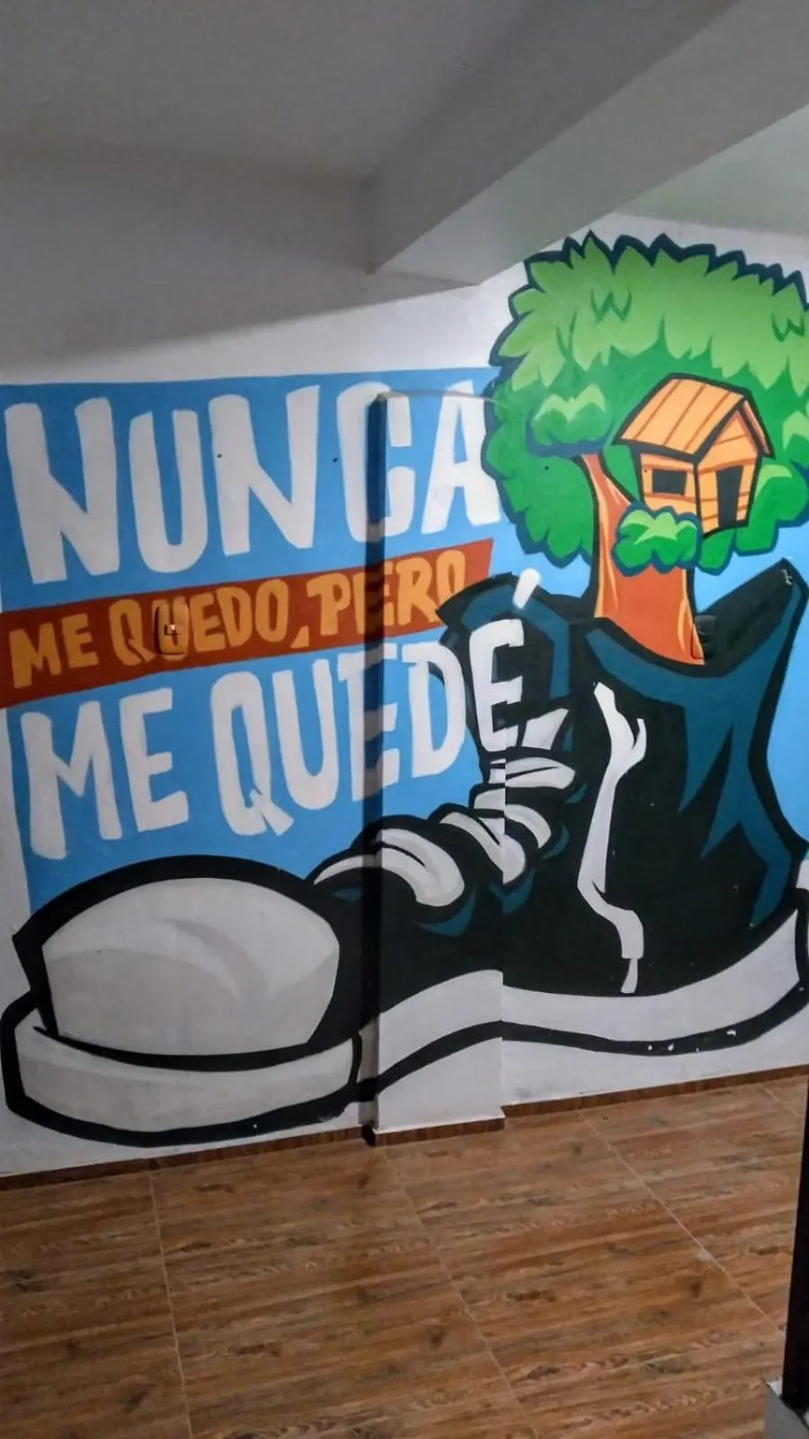 Text overlay in Supertramp Hostel Machupicchu