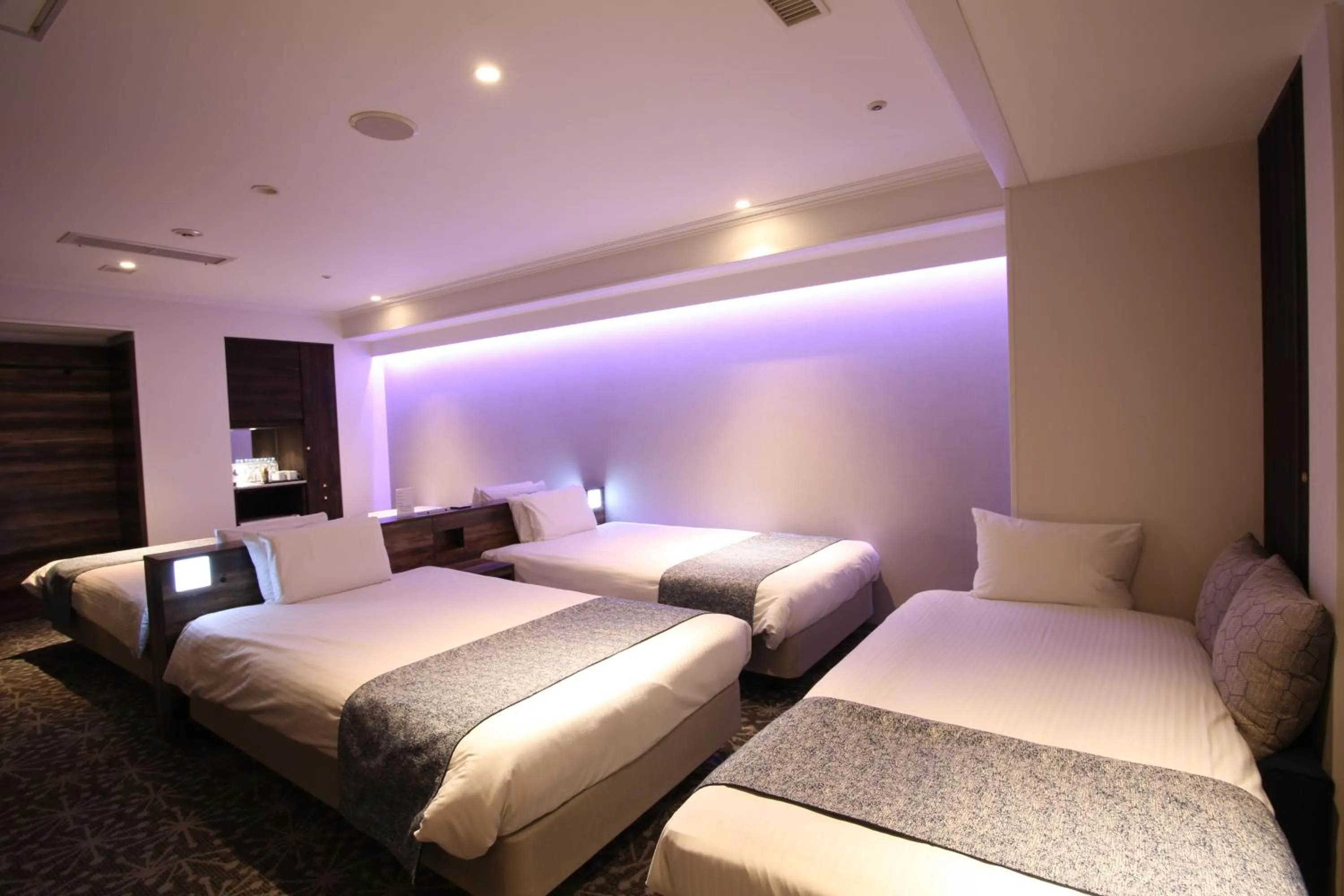 Photo of the whole room, Bed in Quintessa Hotel Sapporo