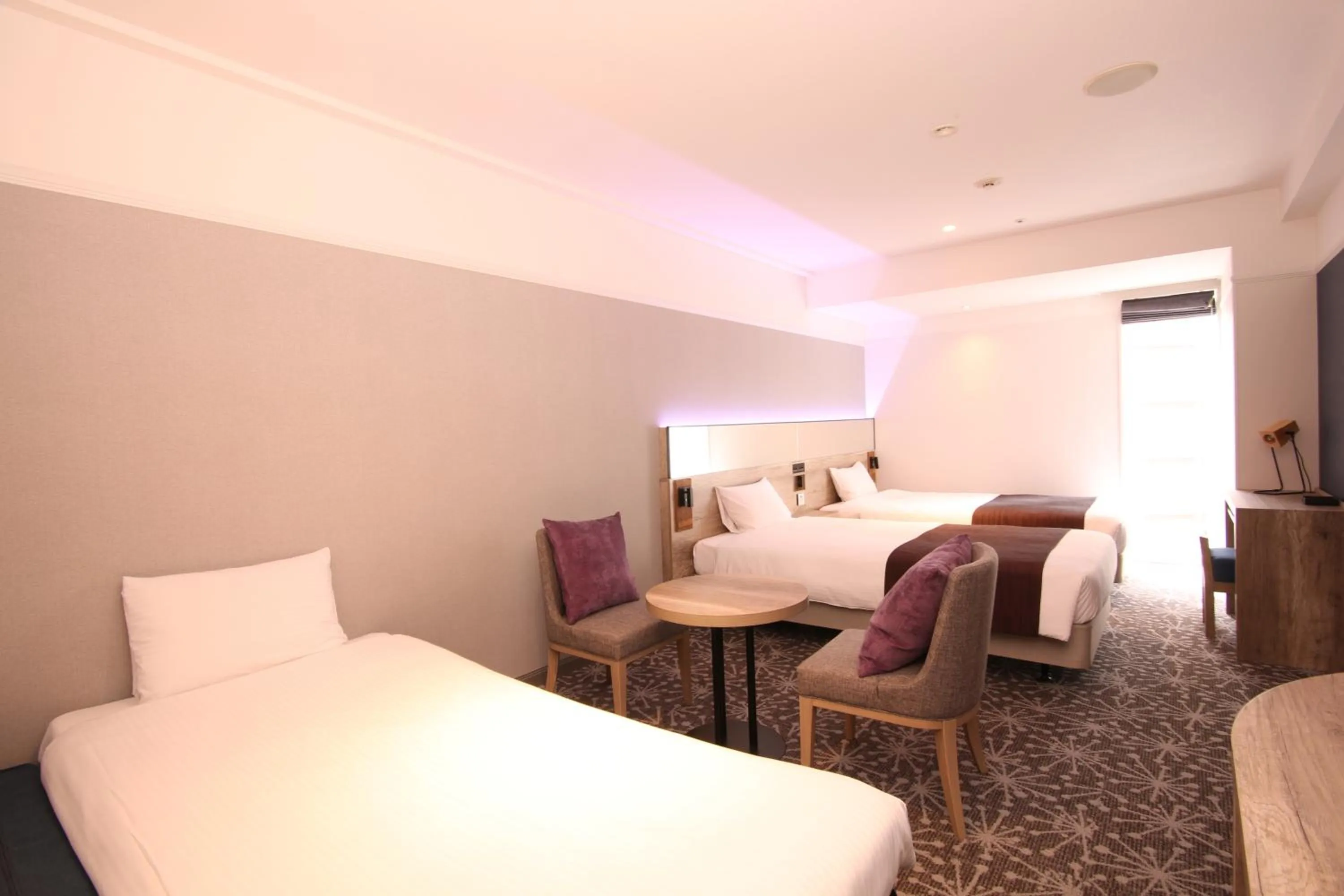 Photo of the whole room, Bed in Quintessa Hotel Sapporo