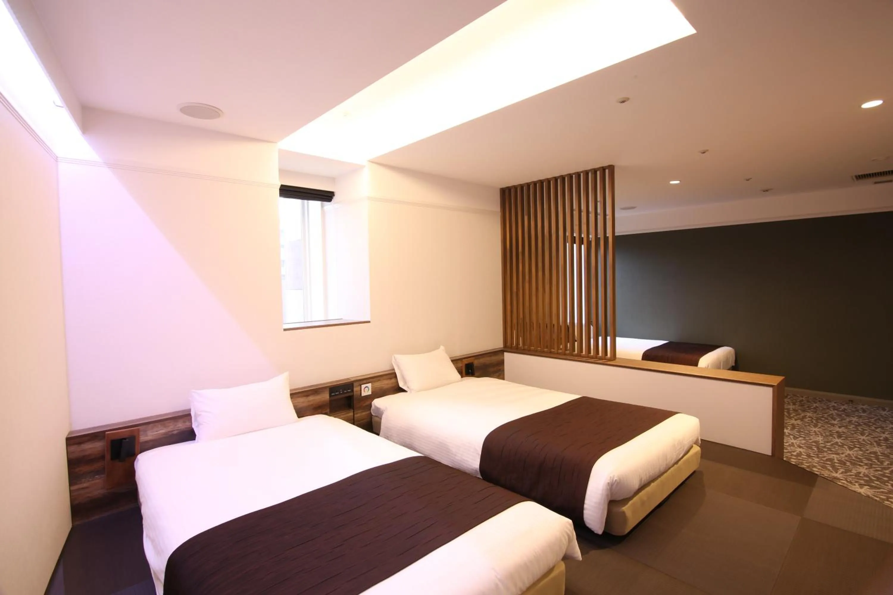 Photo of the whole room, Bed in Quintessa Hotel Sapporo