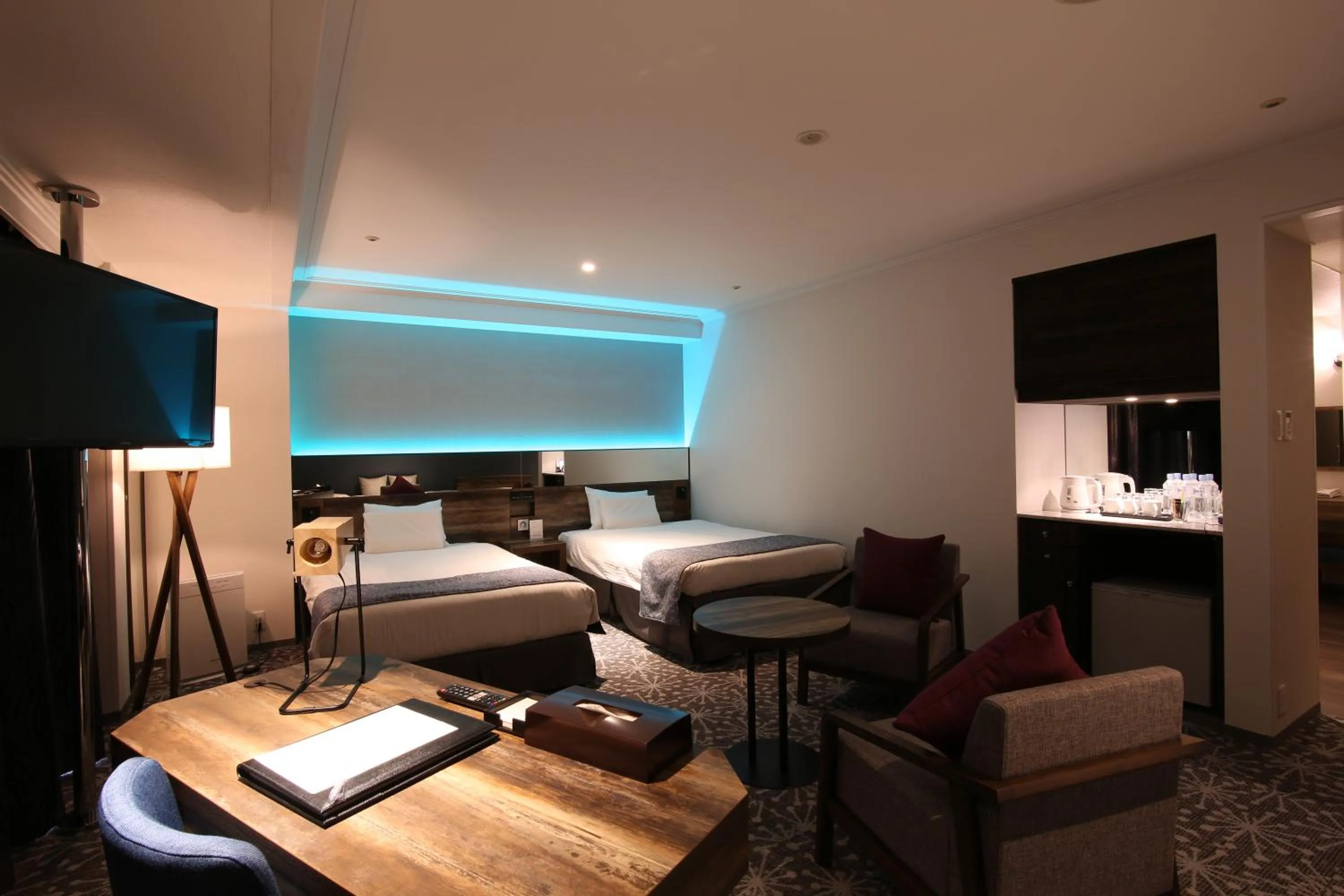 Photo of the whole room, Bed in Quintessa Hotel Sapporo