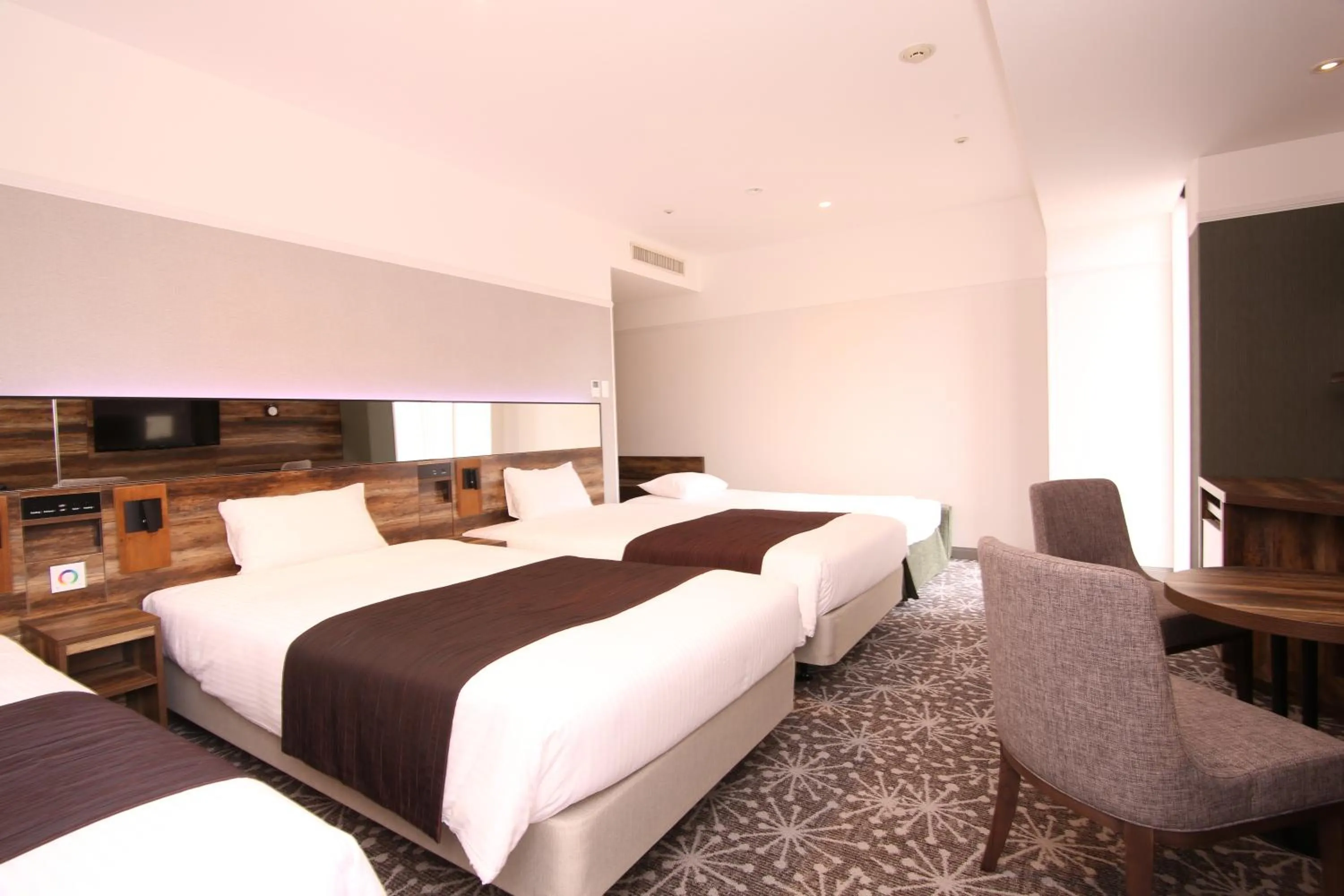 Photo of the whole room, Bed in Quintessa Hotel Sapporo