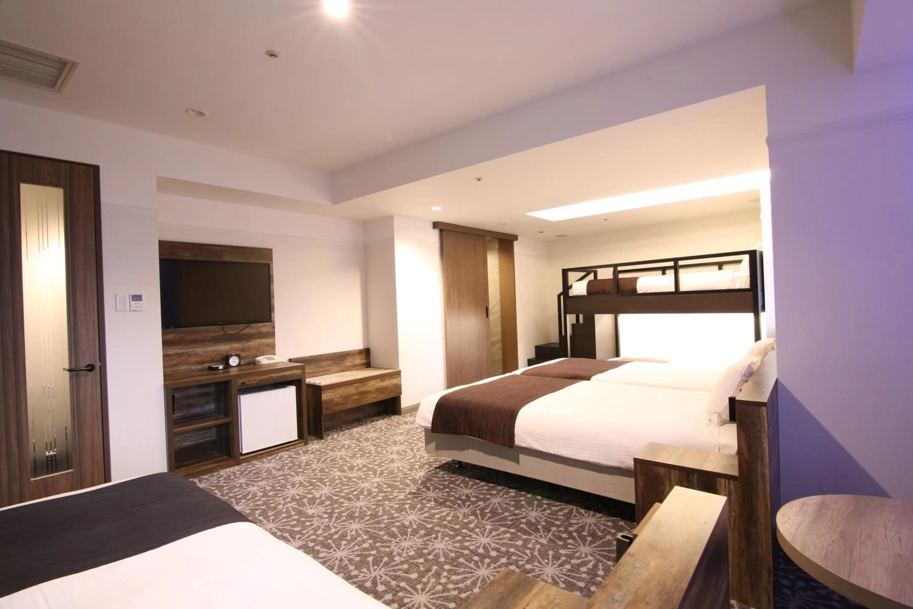 Photo of the whole room, Bed in Quintessa Hotel Sapporo