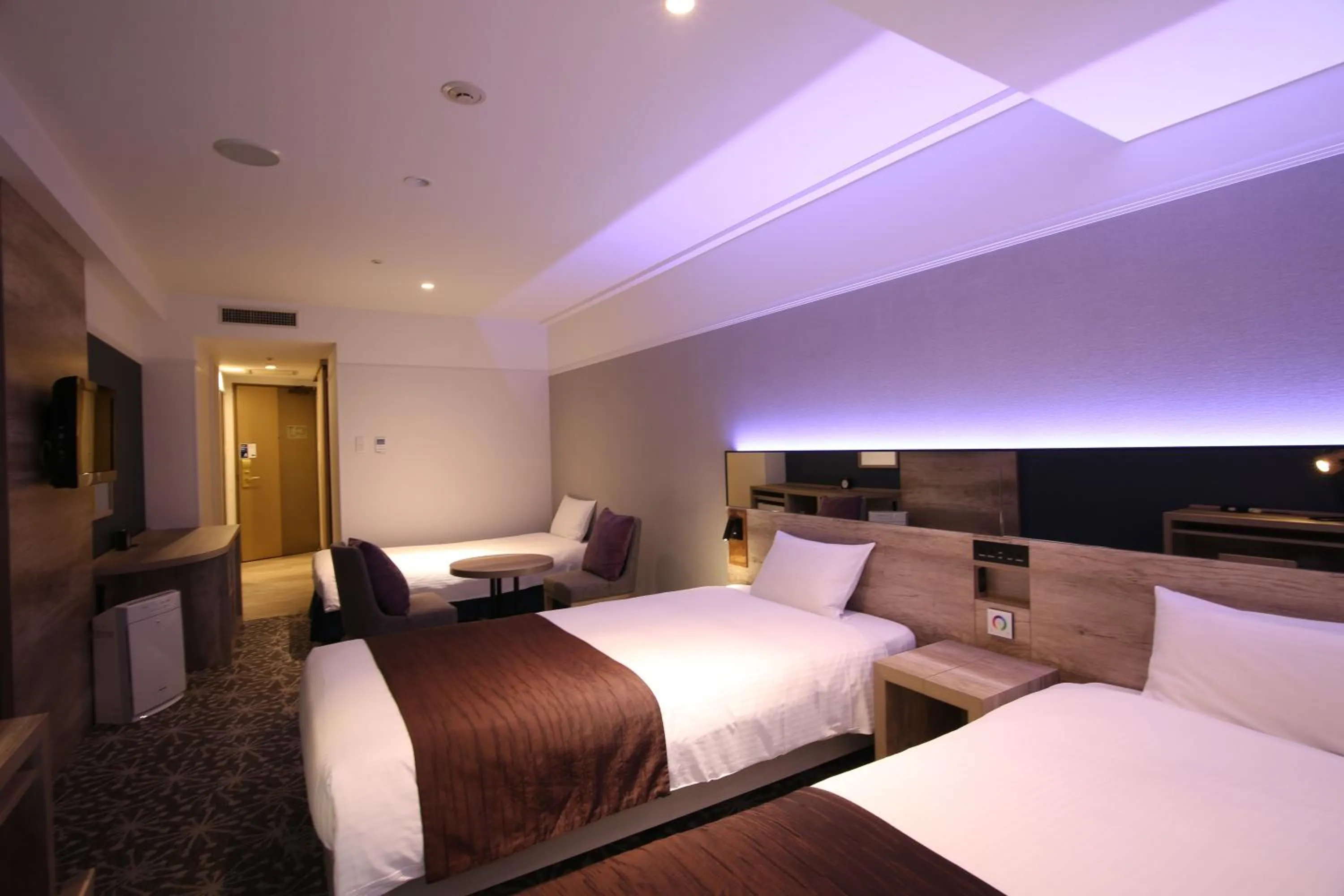 Photo of the whole room, Bed in Quintessa Hotel Sapporo