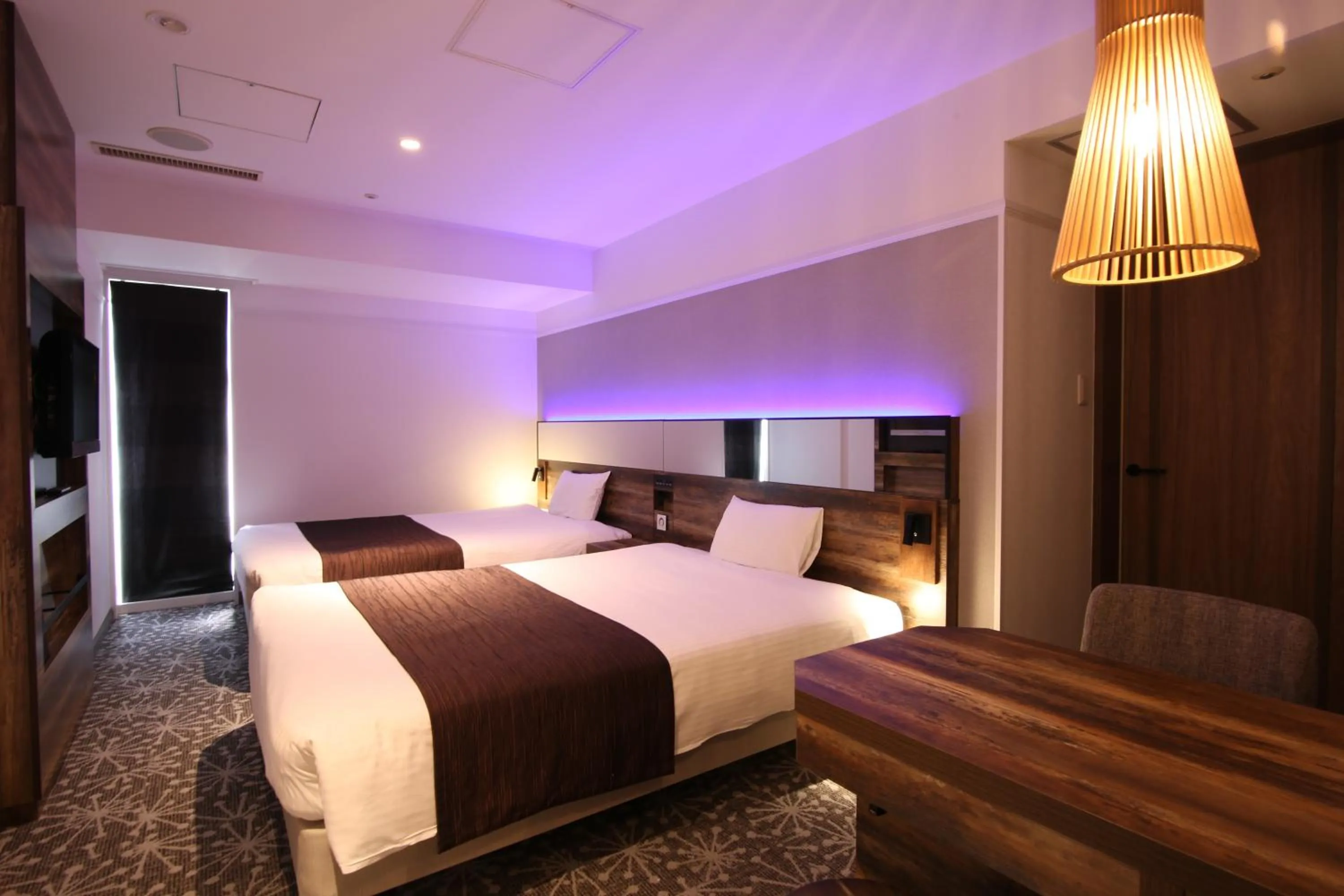 Photo of the whole room, Bed in Quintessa Hotel Sapporo