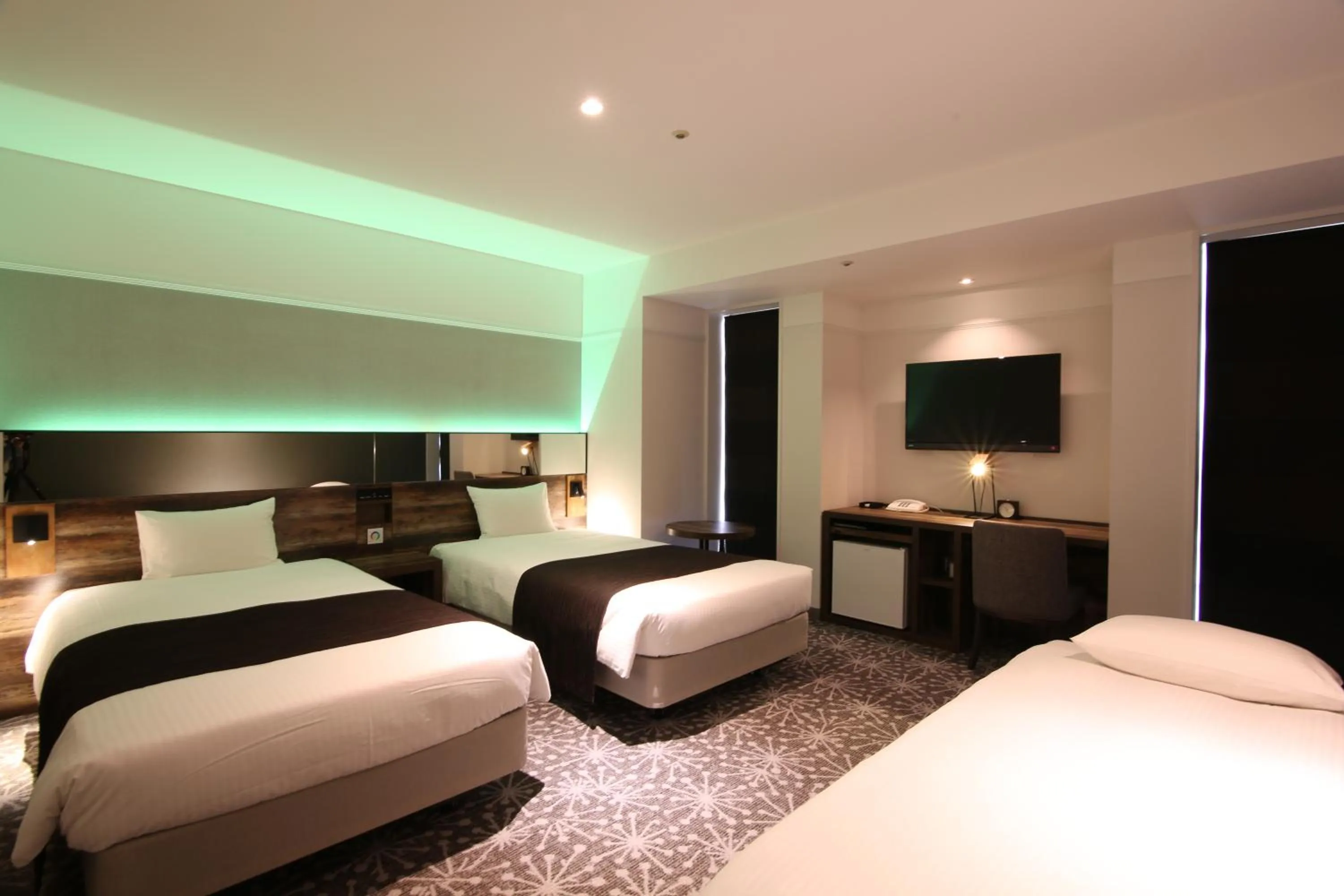 Photo of the whole room, Bed in Quintessa Hotel Sapporo