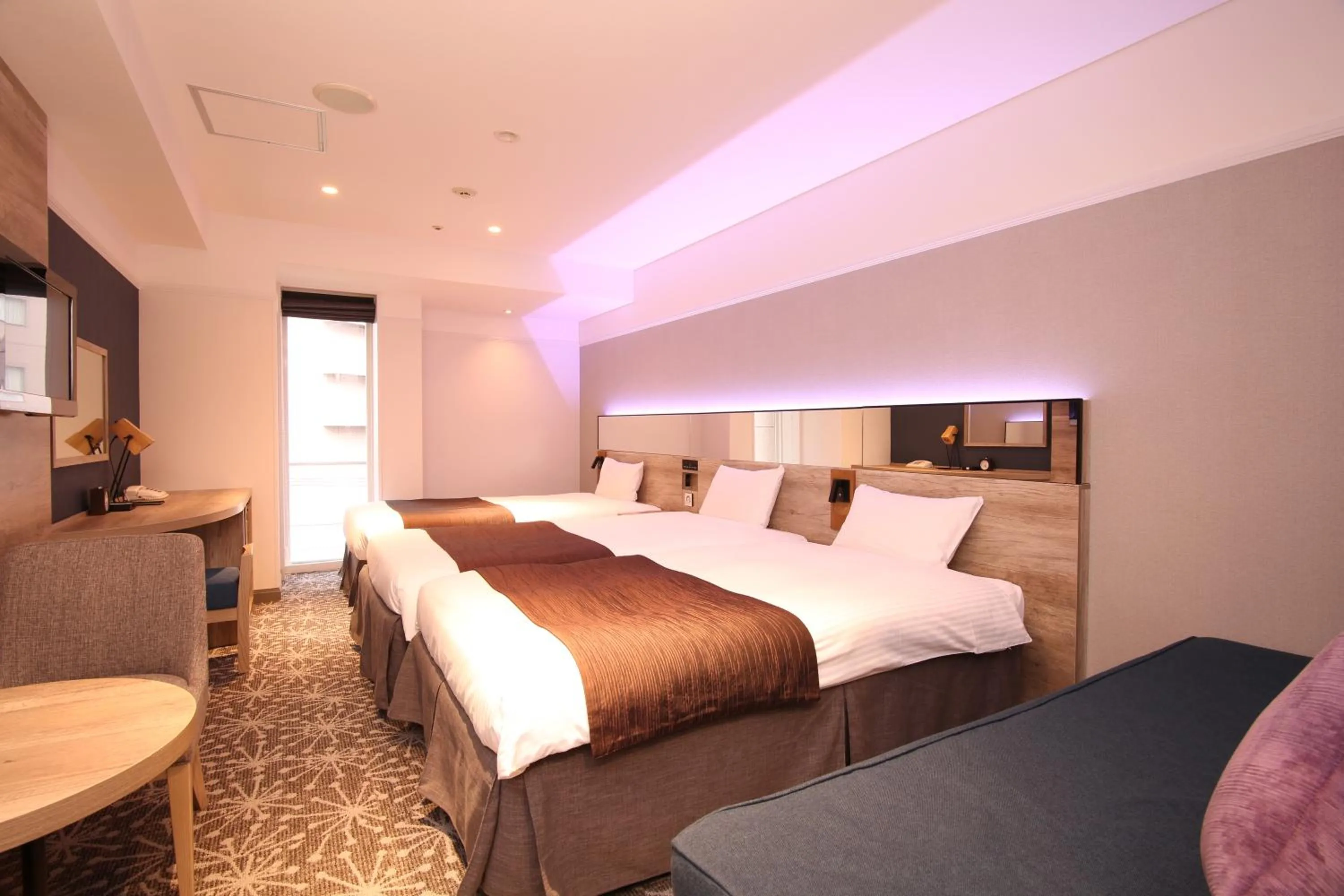 Photo of the whole room, Bed in Quintessa Hotel Sapporo