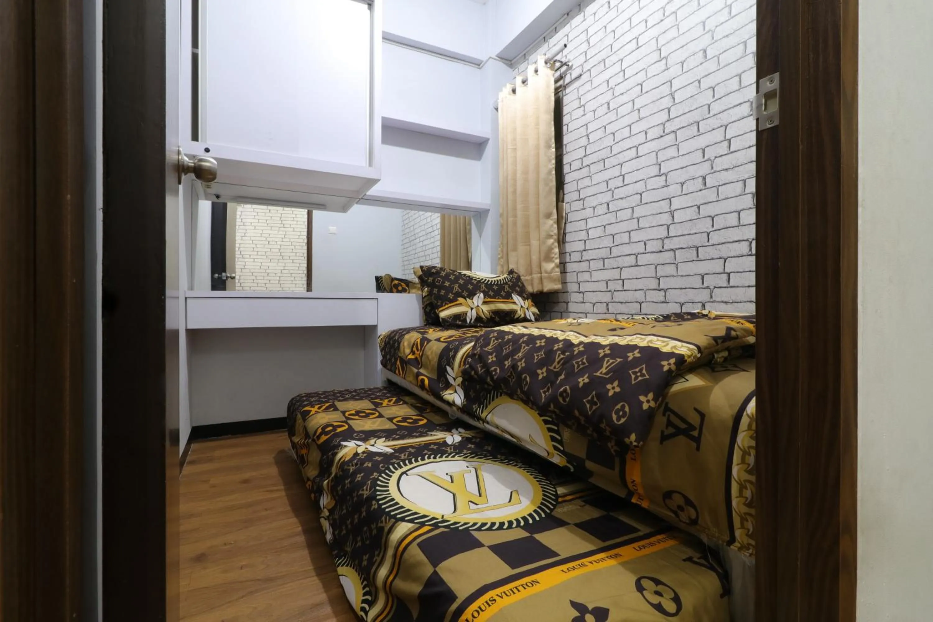 Bedroom, Bed in The Suite Metro Apartment by King Official