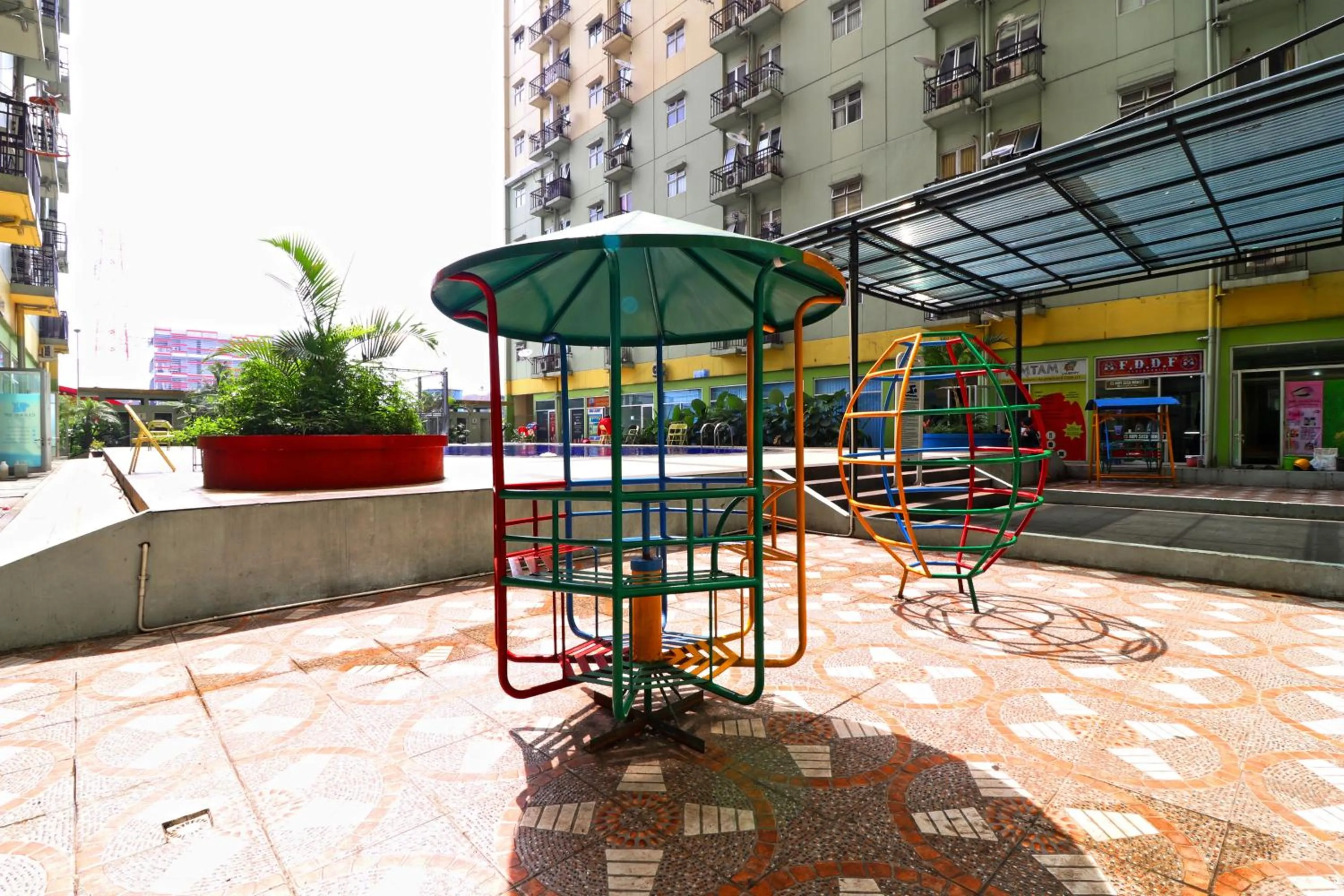 Children play ground in The Suite Metro Apartment by King Official