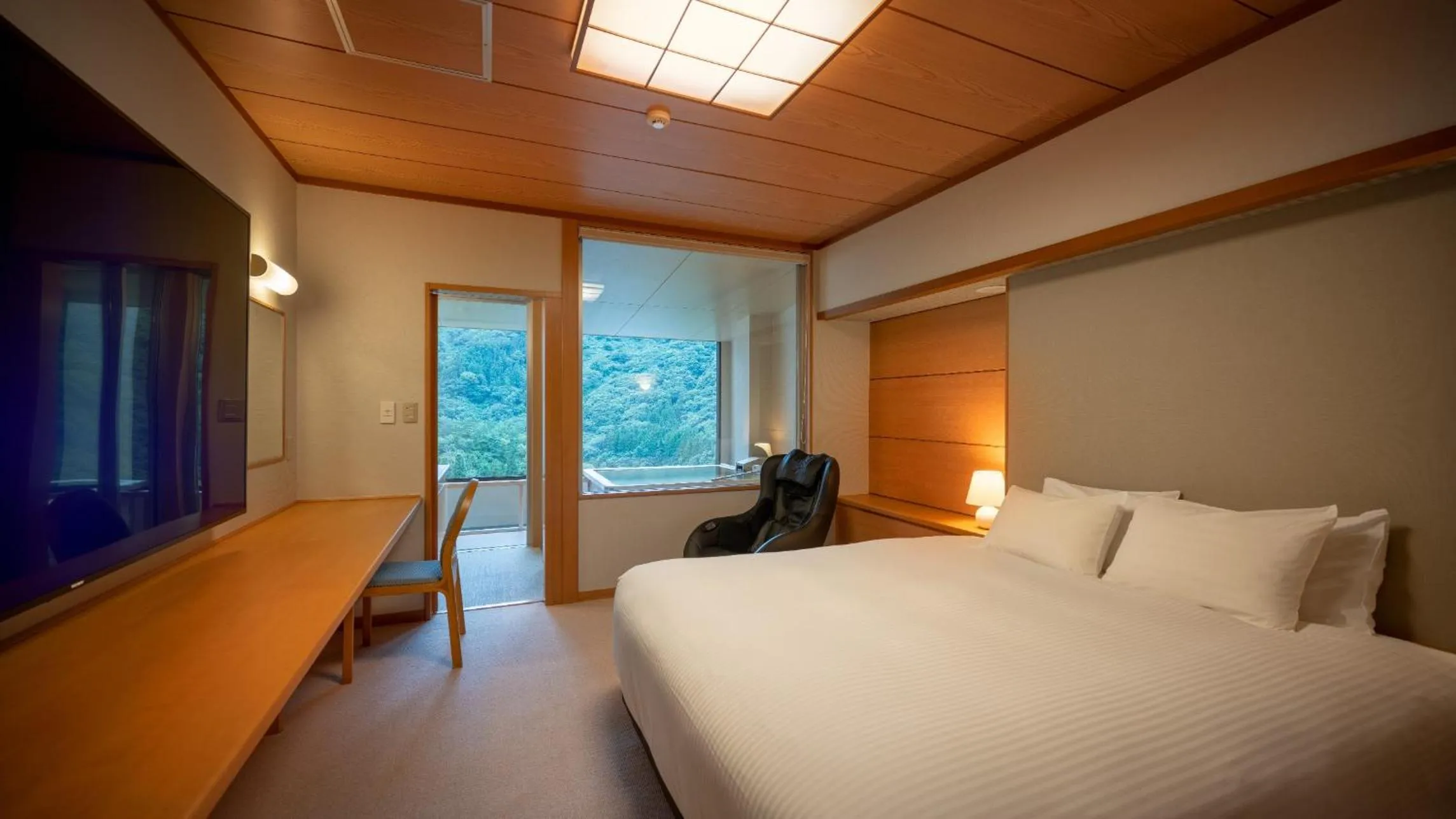 Bed in Marumine Kanko Hotel