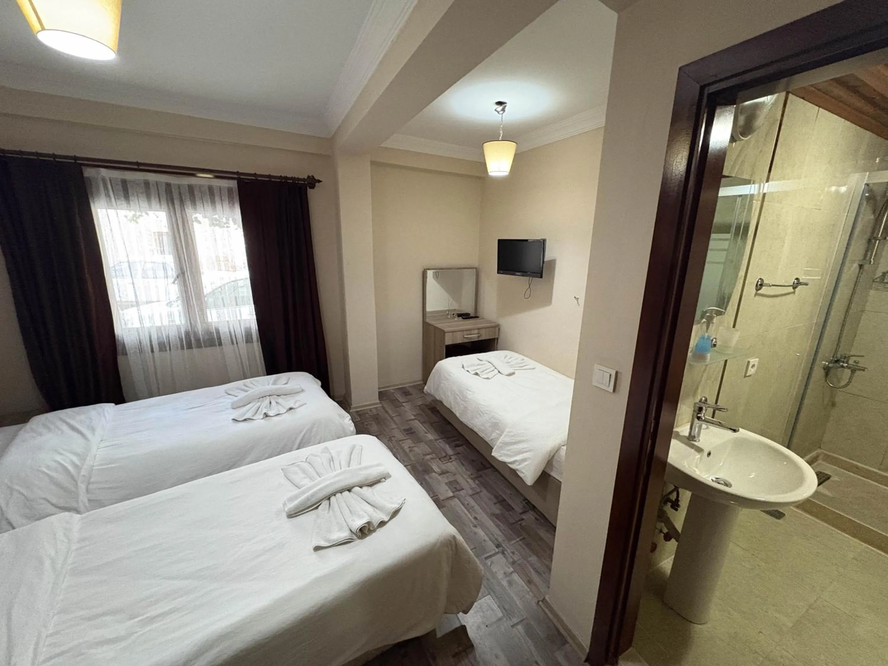 Shower, Bed in Akay Hotel