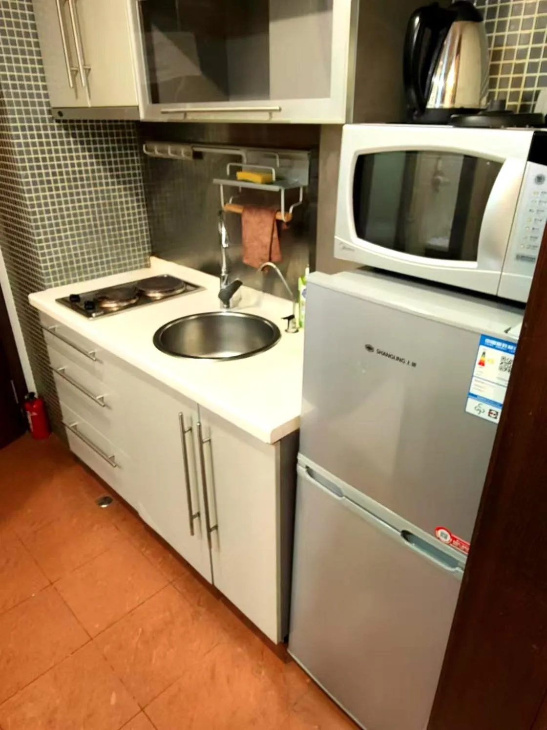 Kitchen or kitchenette in Xinshikong Apartments- Abest Zhongshan Park No.1