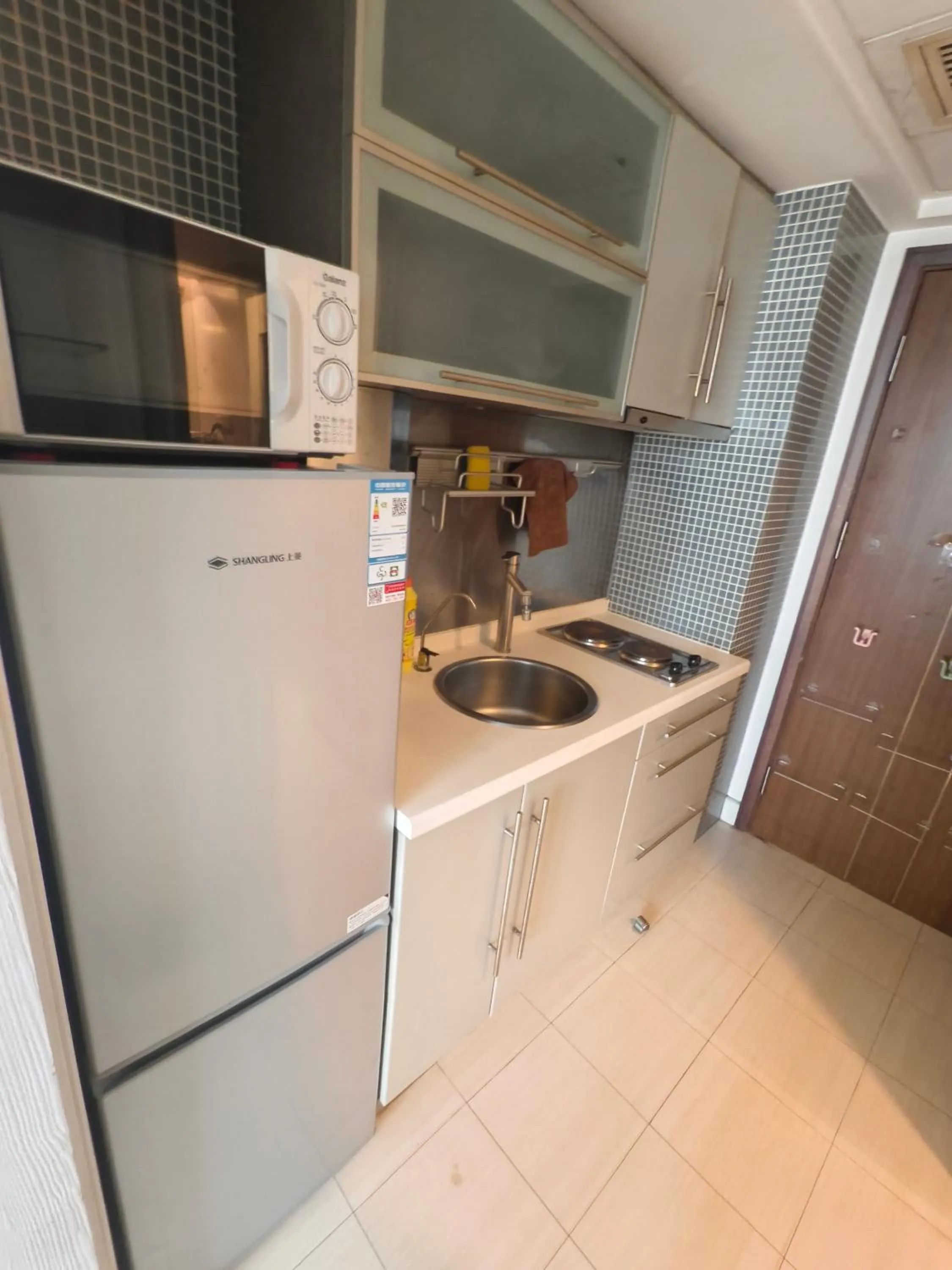 Kitchen or kitchenette in Xinshikong Apartments- Abest Zhongshan Park No.1