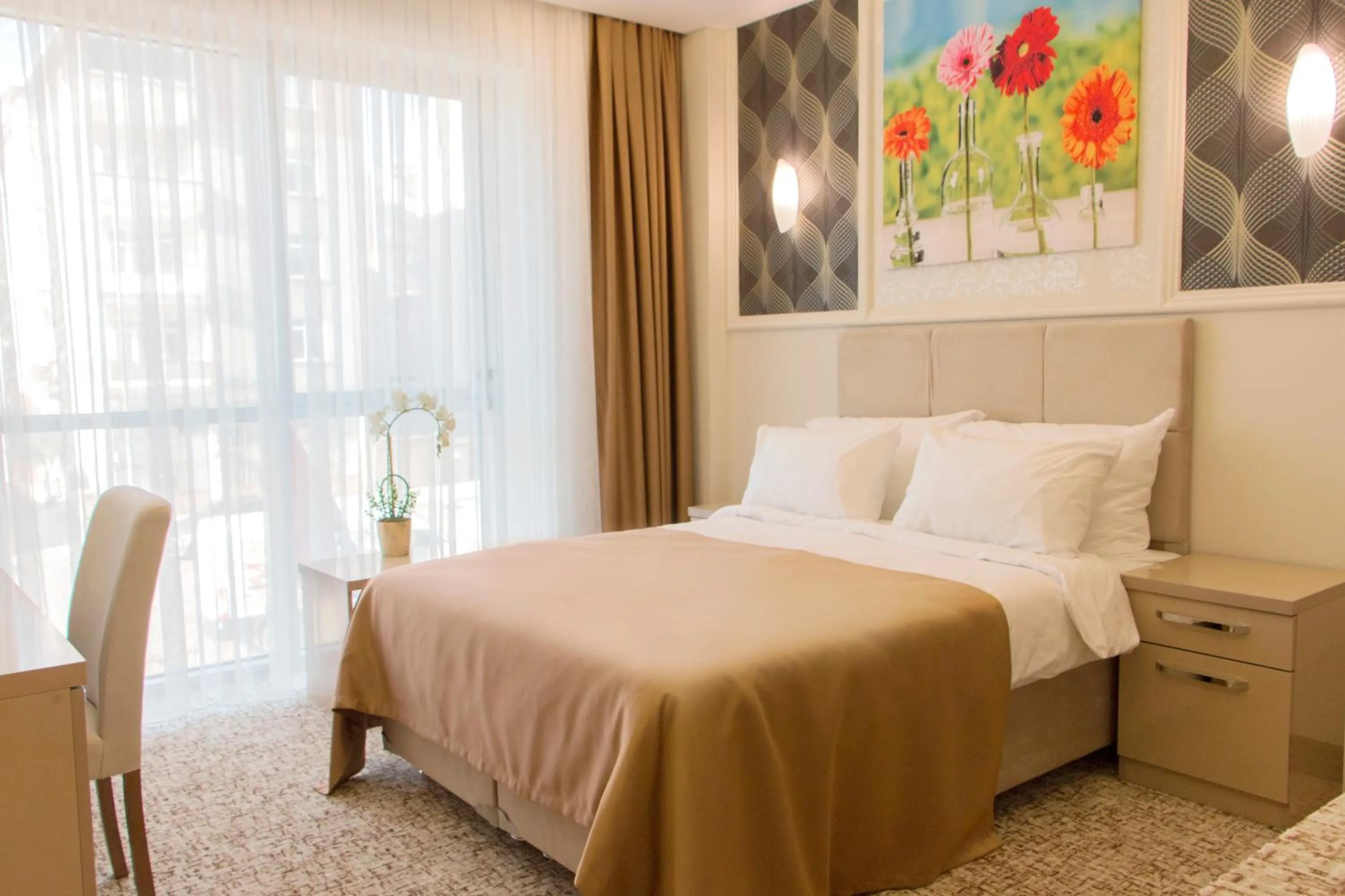 Bed in Goldhan Hotel