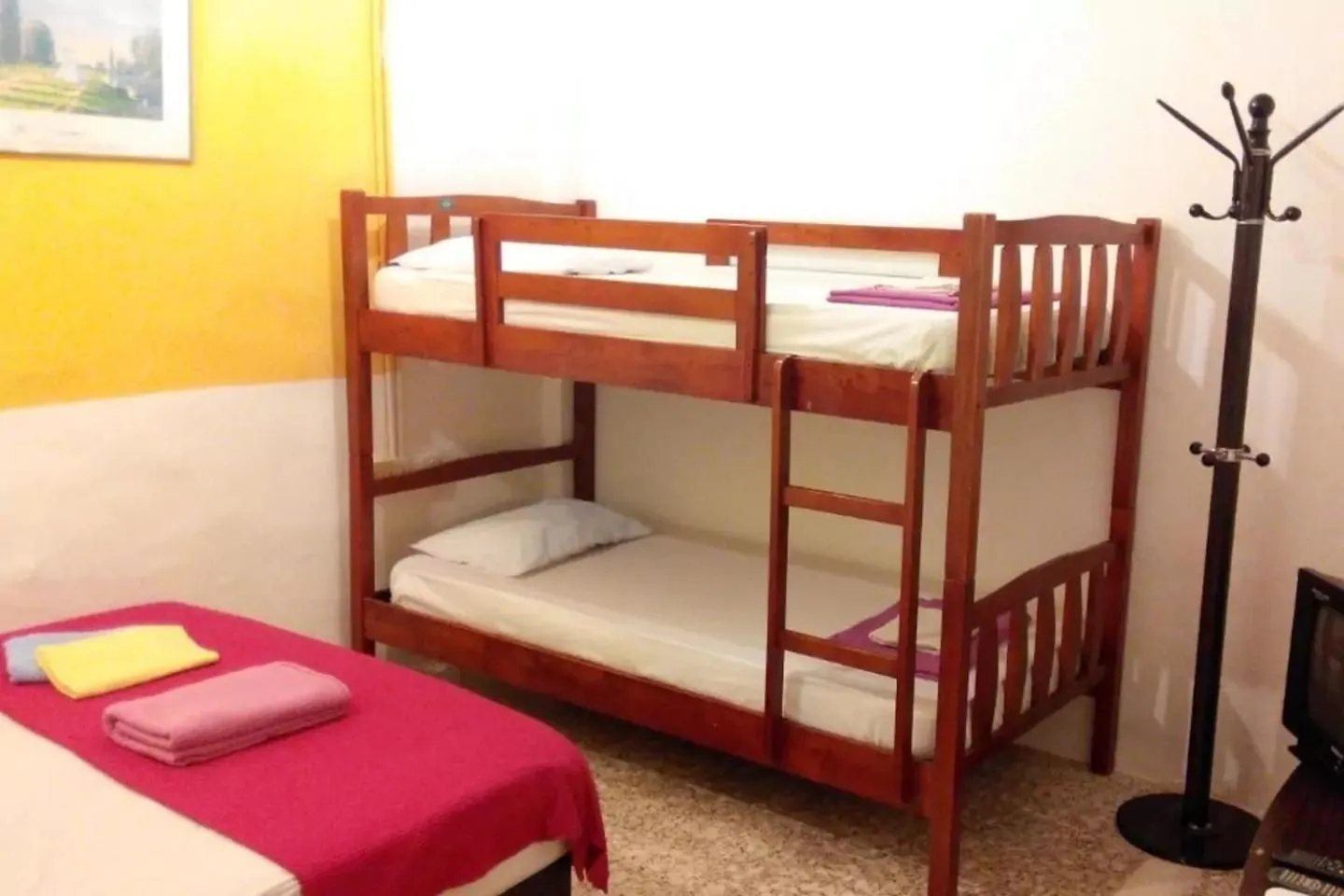 Bed in Cocoa Mews Cafe and Homestay