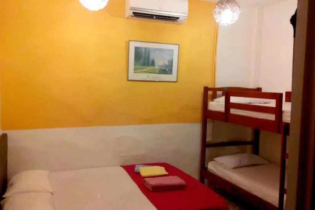 Bed in Cocoa Mews Cafe and Homestay