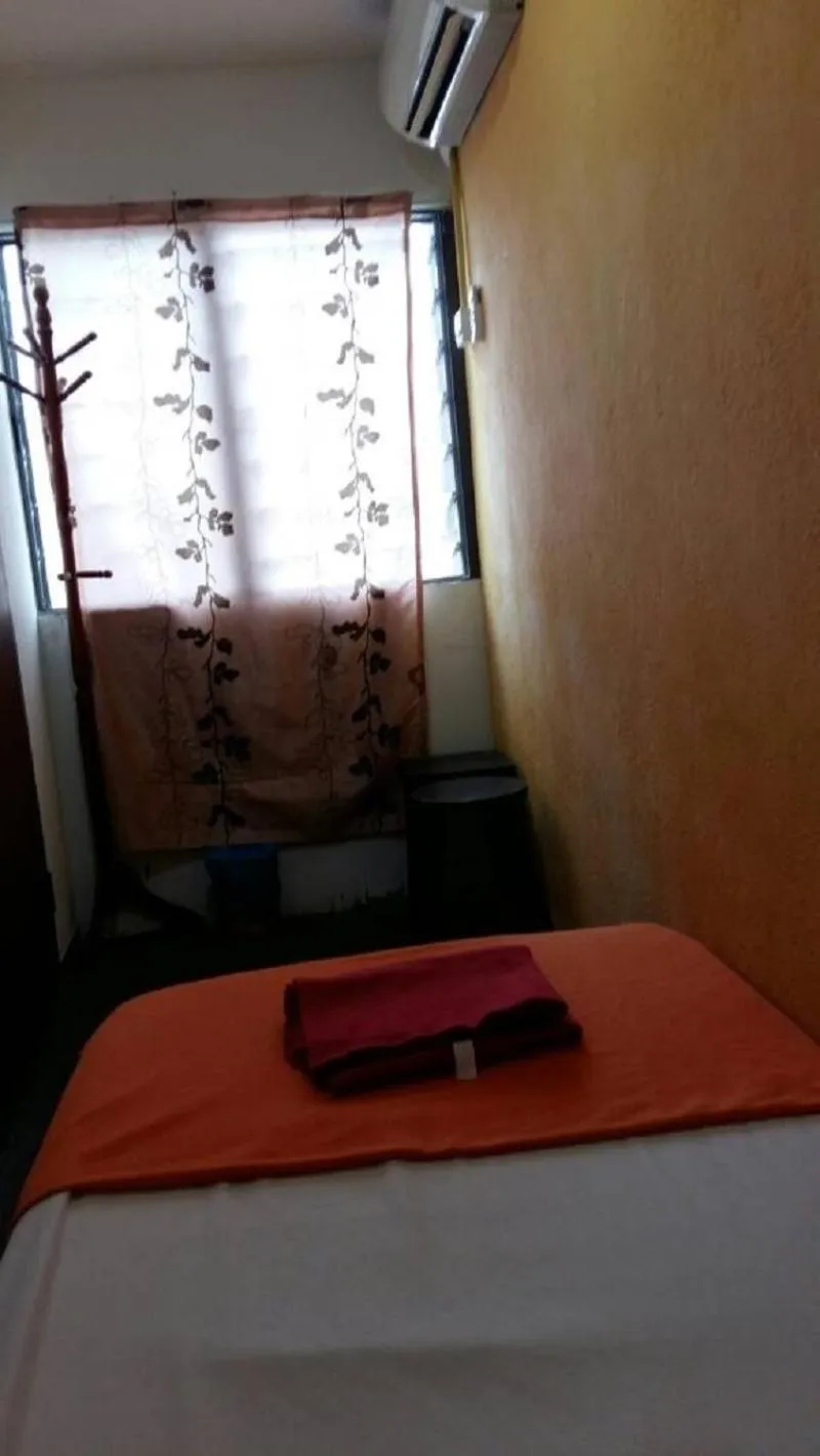 Bed in Cocoa Mews Cafe and Homestay