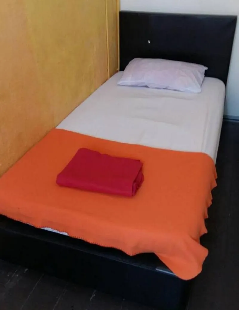 Bed in Cocoa Mews Cafe and Homestay