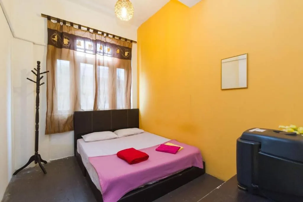 Bed in Cocoa Mews Cafe and Homestay