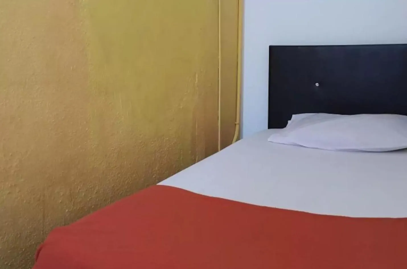 Bed in Cocoa Mews Cafe and Homestay