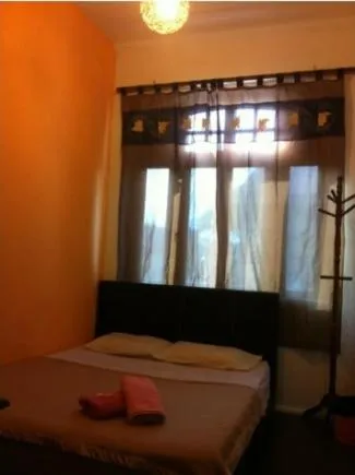 Bed in Cocoa Mews Cafe and Homestay