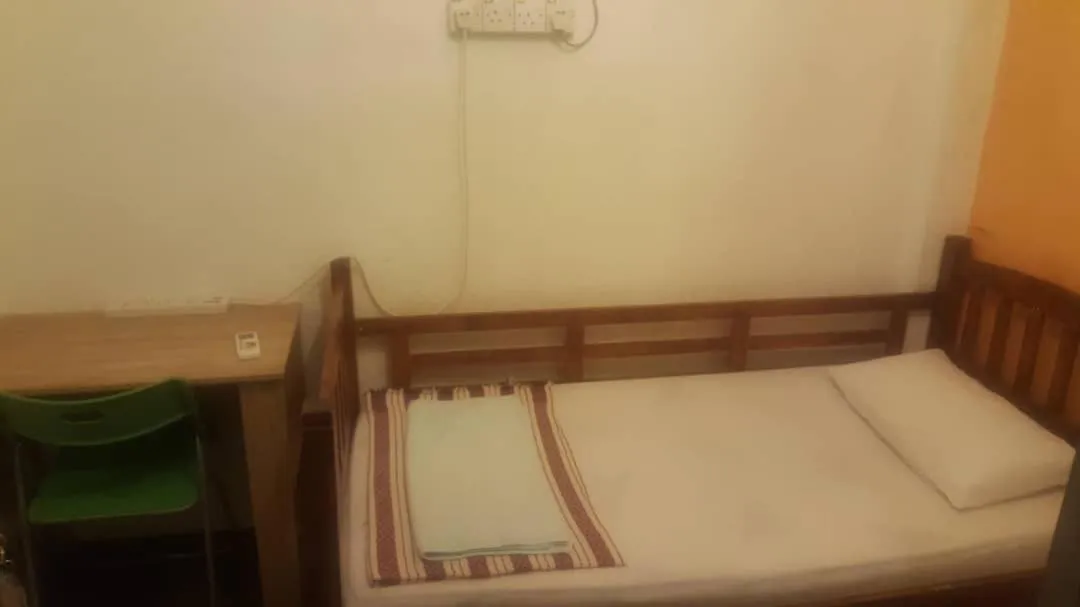 Bed in Cocoa Mews Cafe and Homestay