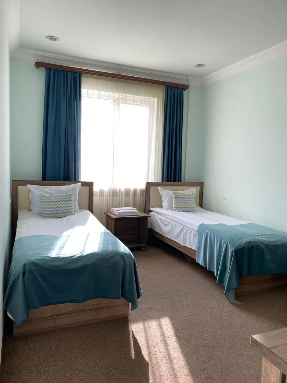 Bed in Mina Hotel