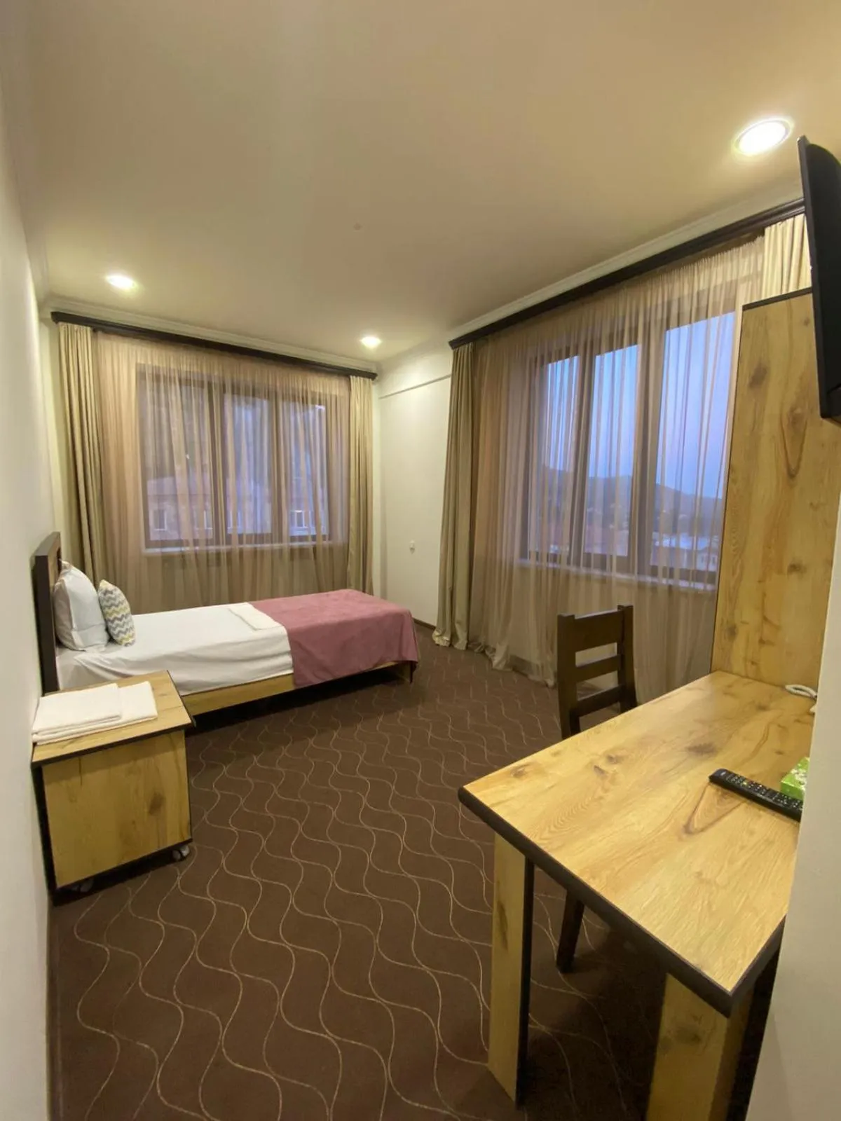Bed in Mina Hotel