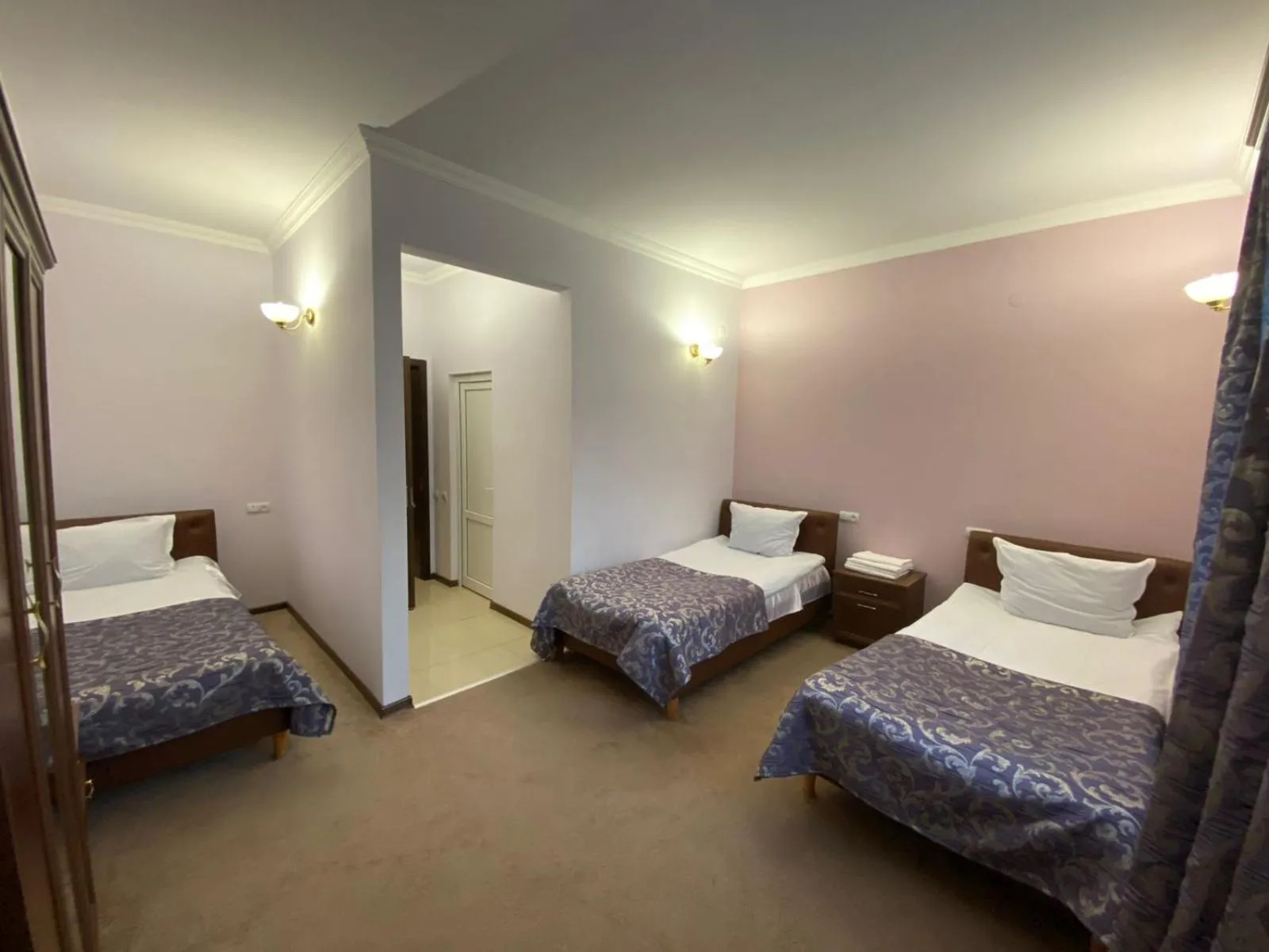 Bed in Mina Hotel