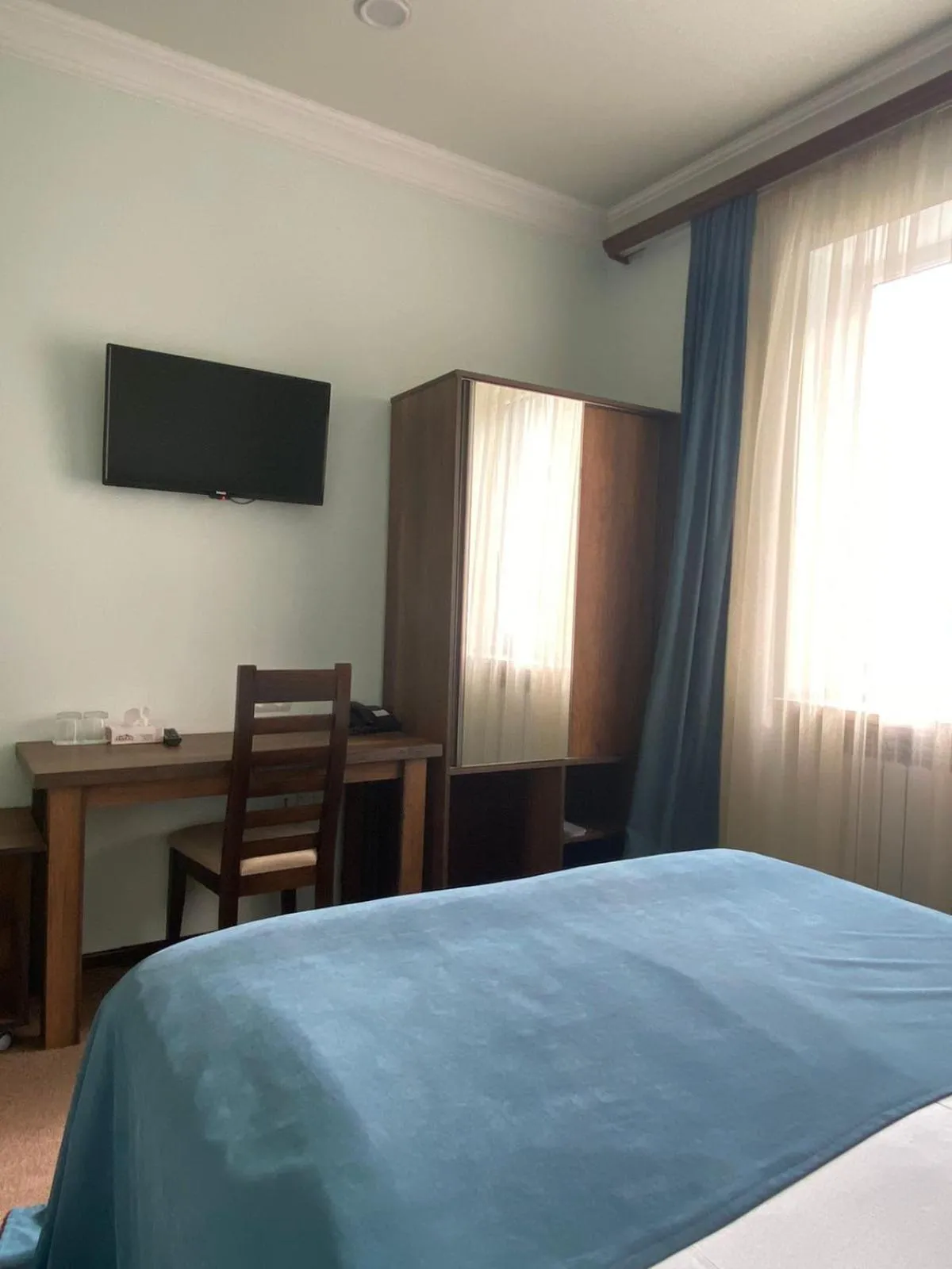 Bed in Mina Hotel