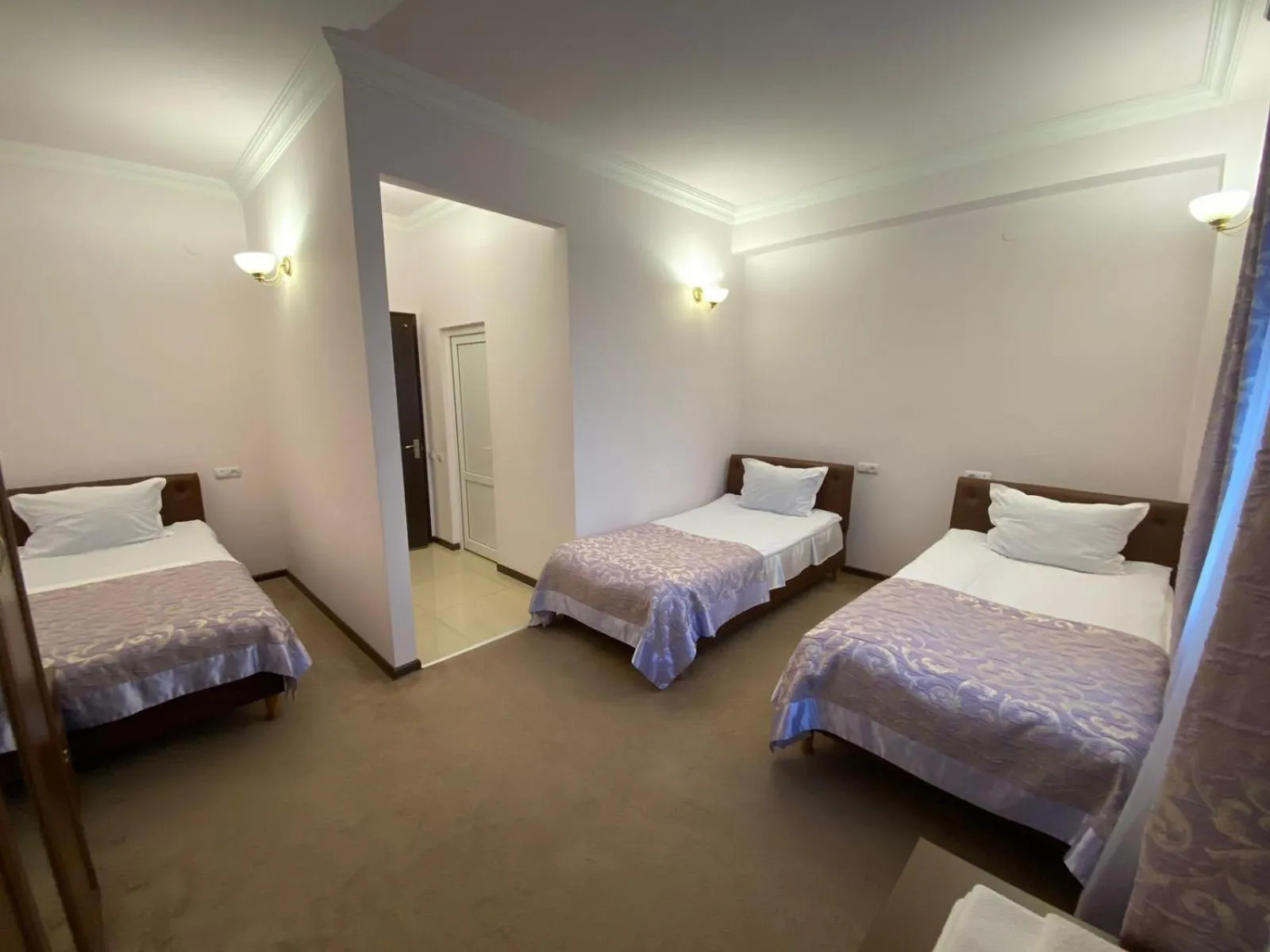 Bed in Mina Hotel